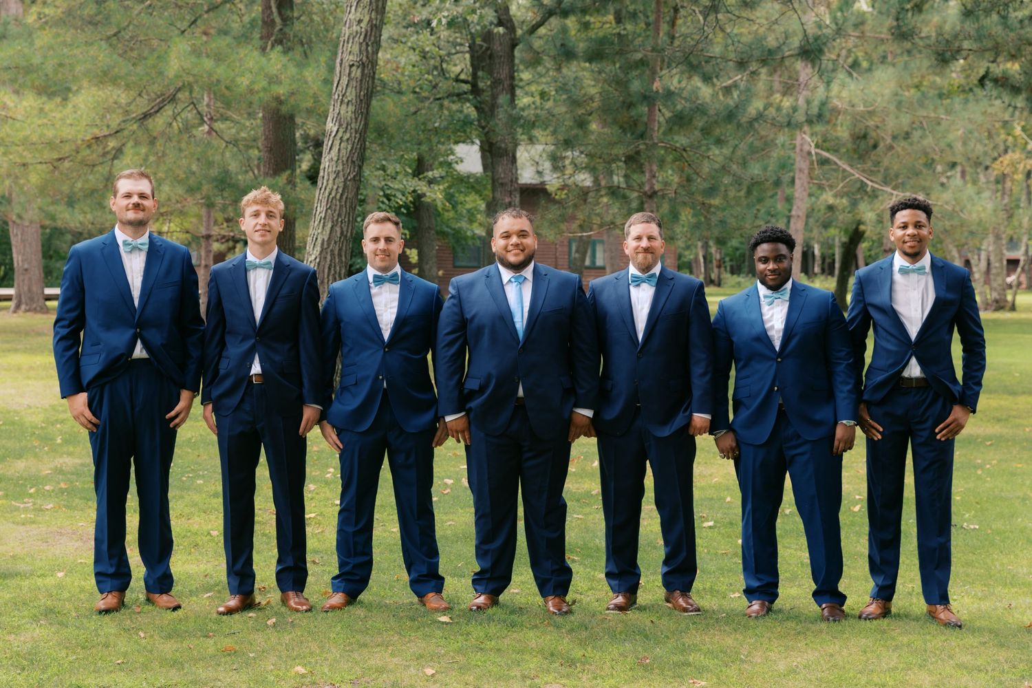 Summer Camp Themed Wedding Photography at Camp Lincoln Camp Lake Hubert in Nisswa Minnesota. Lakeside woodland wedding pictures Up North