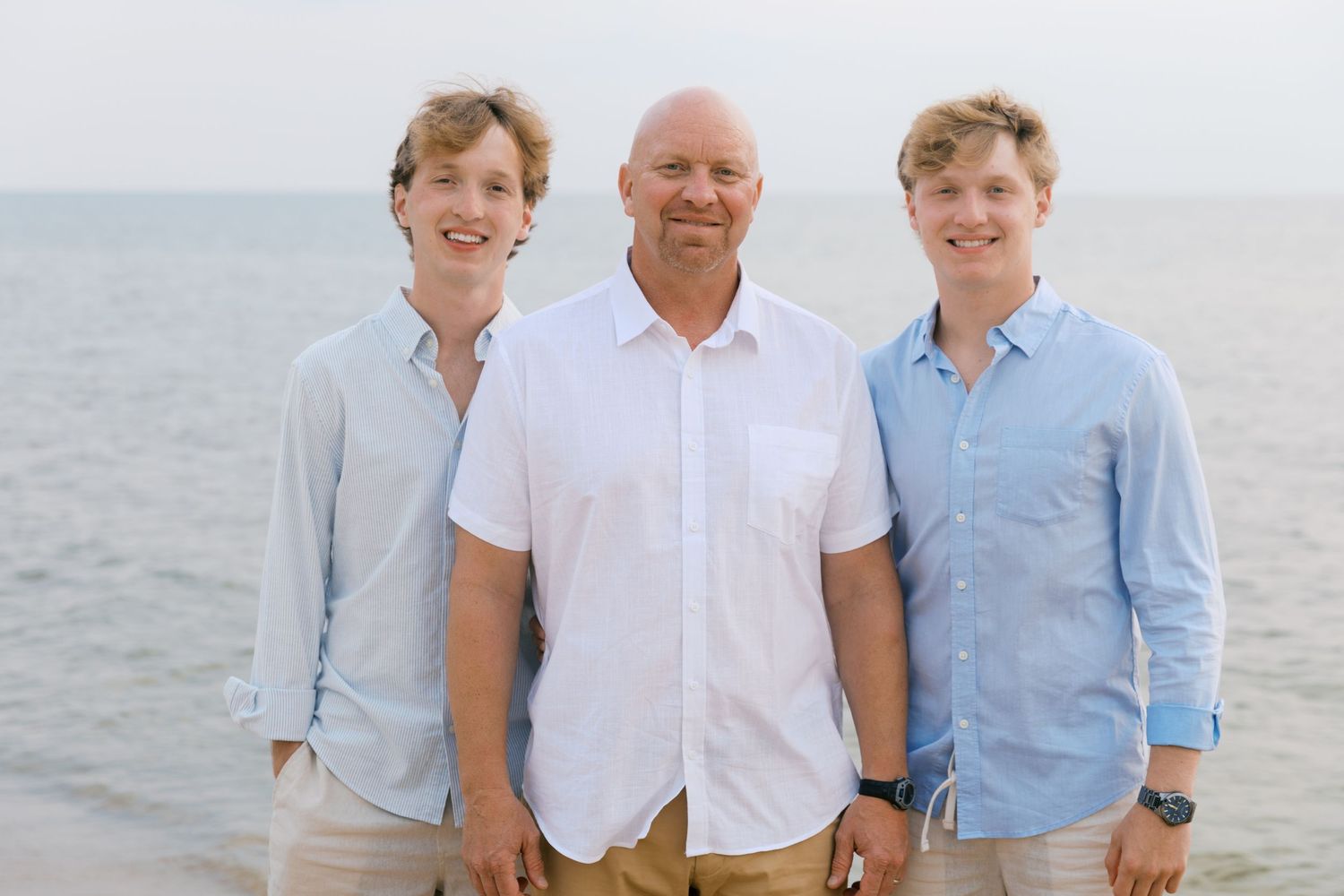 Grand Haven Summer Beach Family Pictures Lake Michigan. West Michigan Family Photographer Blue and white beach family outfit inspiration