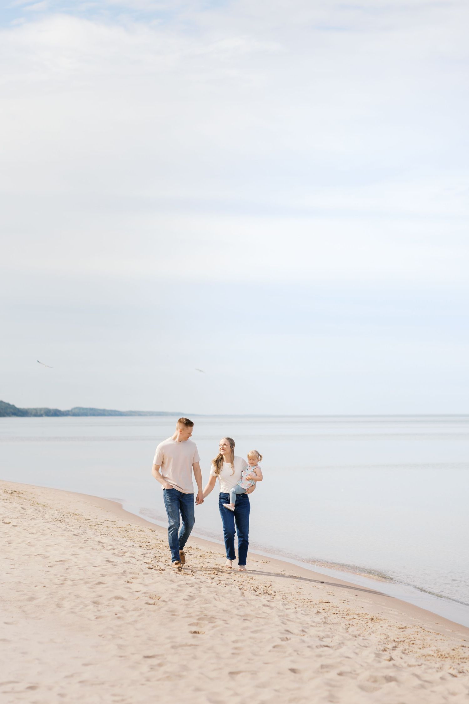 Grand Haven Michigan Beach Photography Family senior engagement photography on Lake Michigan. Grand Haven Michigan Photographer Inspiration