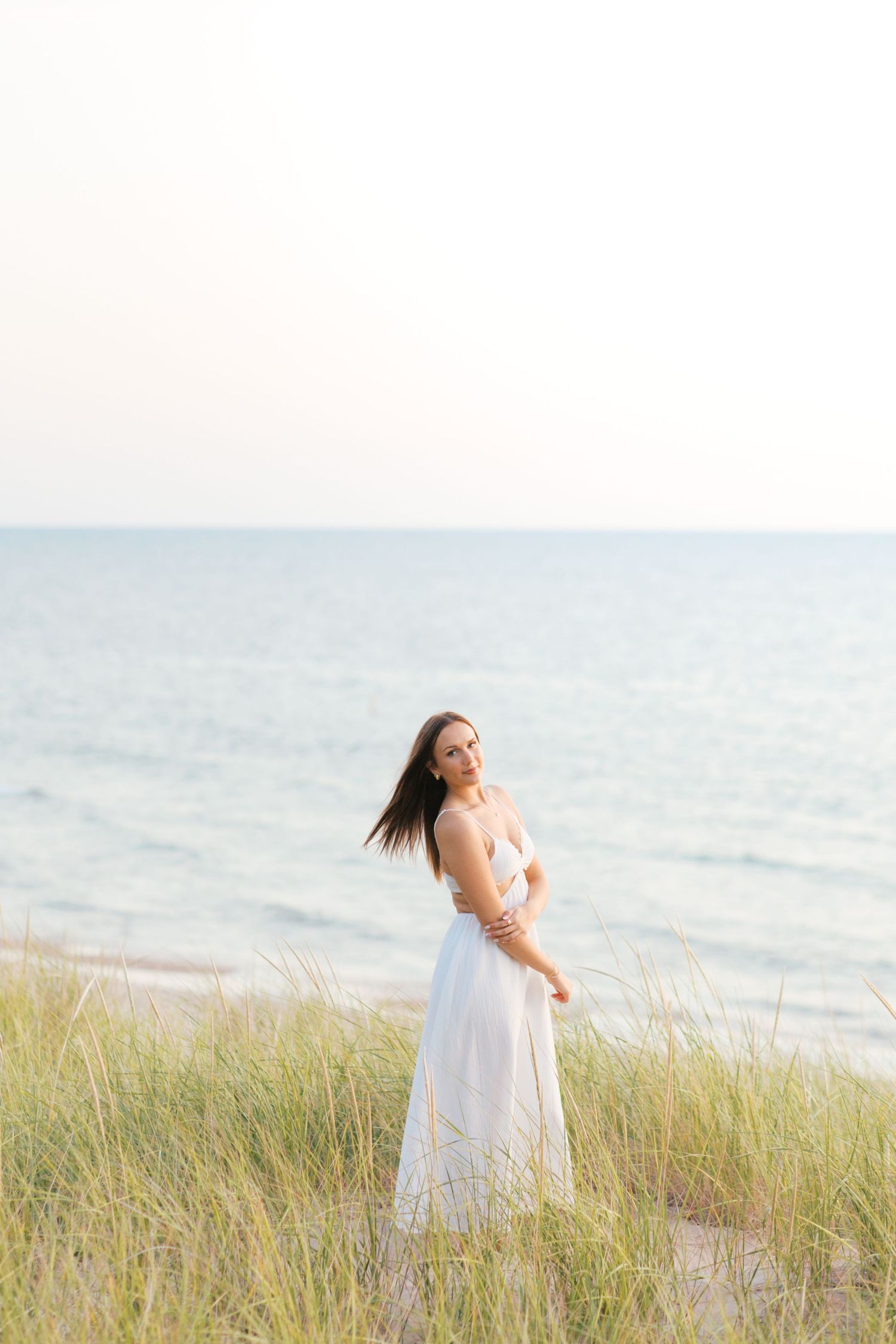 Grand Haven Michigan senior portrait photography pictures, Beach and boardwalk location. summer beach senior pictures in west michigan