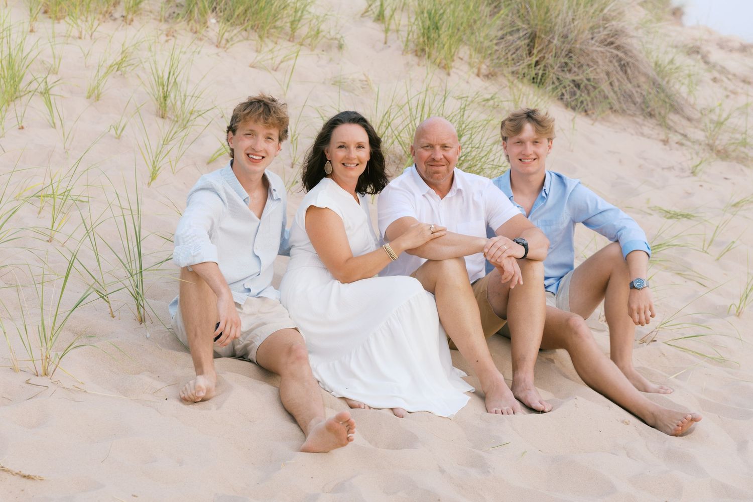 Grand Haven Summer Beach Family Pictures Lake Michigan. West Michigan Family Photographer Blue and white beach family outfit inspiration