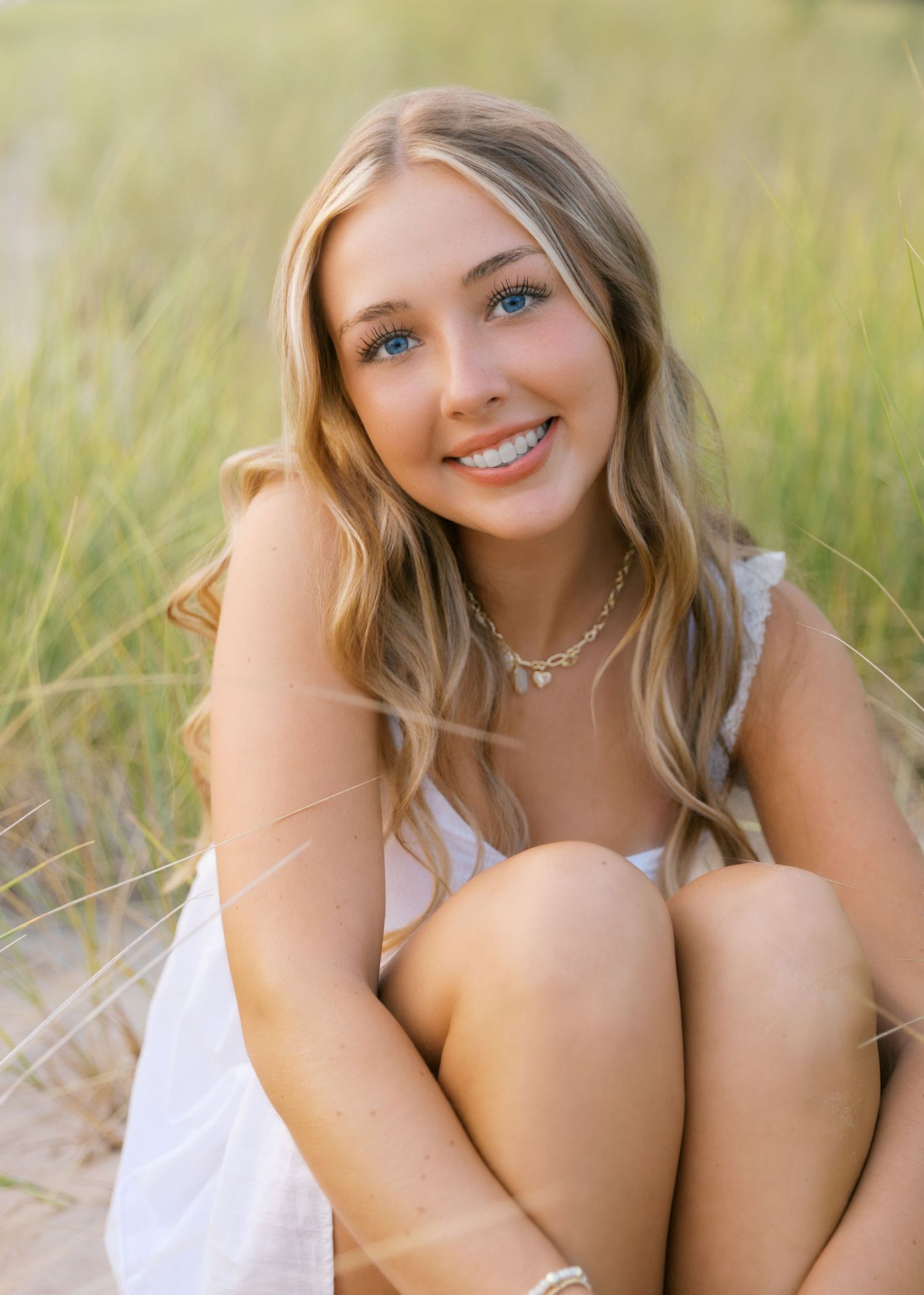 Senior Portrait Photography in Grand Haven Michigan a coastal beachtown on Lake Michigan. Beaches and downtown, sand dunes, senior year