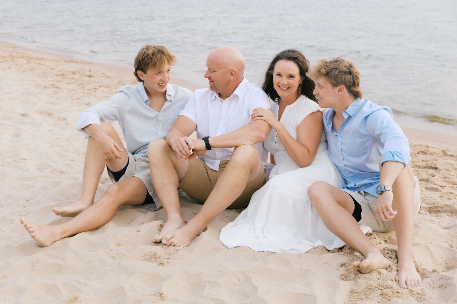 Grand Haven Summer Beach Family Pictures Lake Michigan. West Michigan Family Photographer Blue and white beach family outfit inspiration