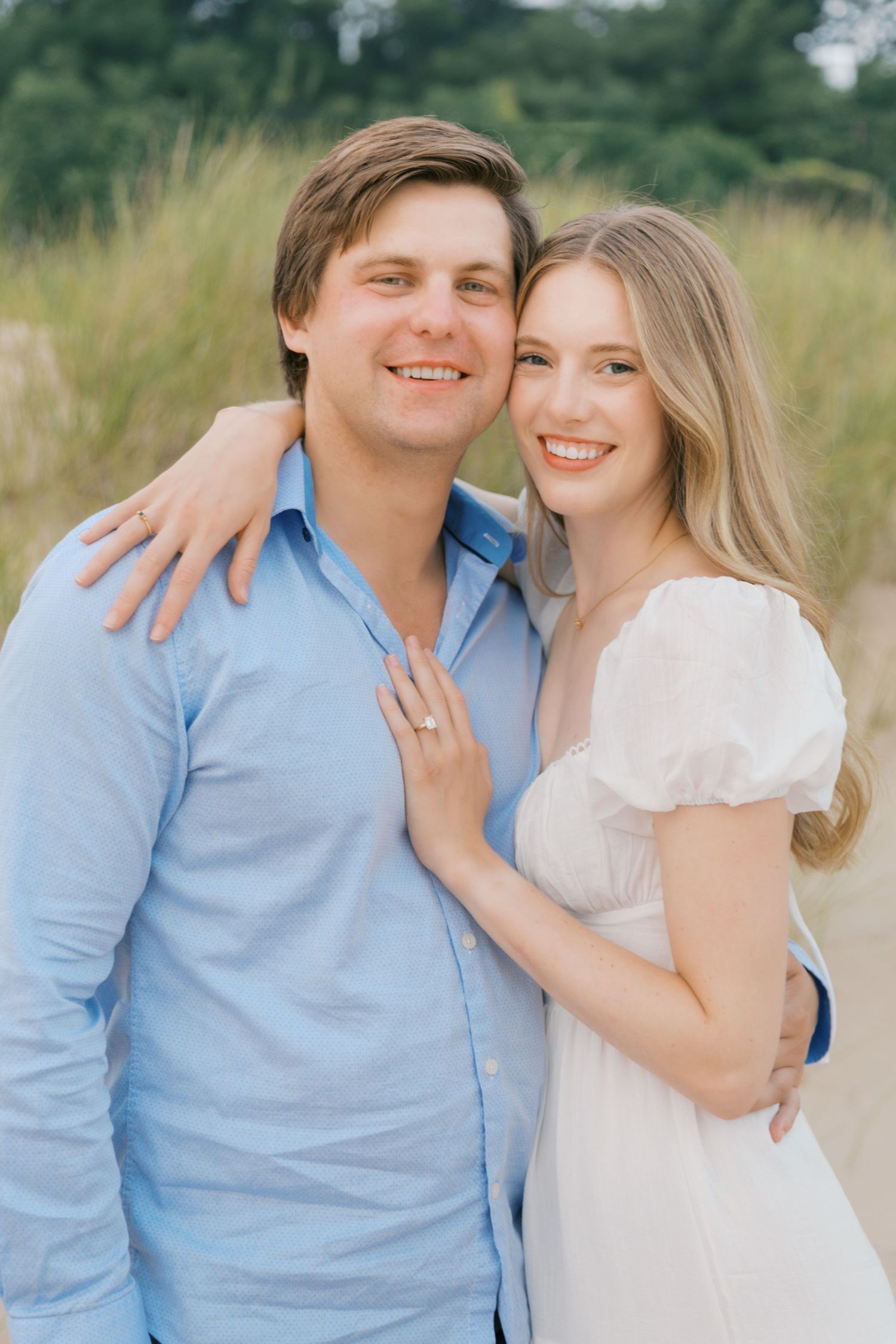 Grand Haven beach and boardwalk coastal midwest town on lake michigan engagement pictures during the summer Grand Haven Wedding photographer