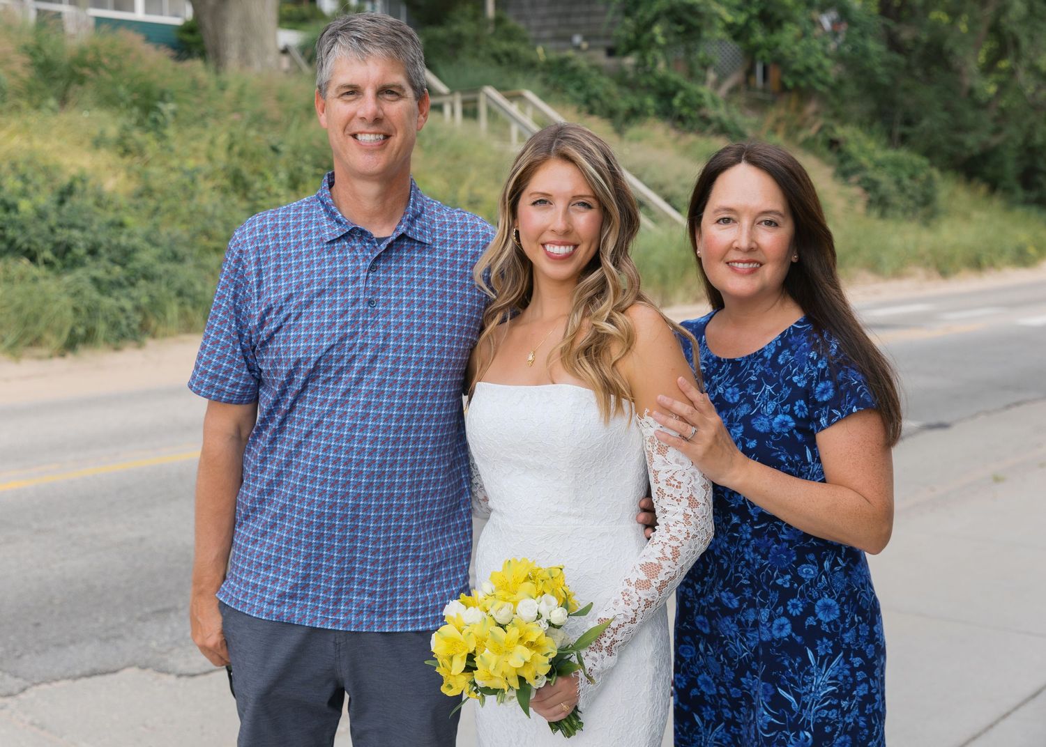 Grand Haven Michigan Elopement Photography at Grand Haven City Beach on Lake Michigan. Coastal summer elopement. From, Rayna Photography