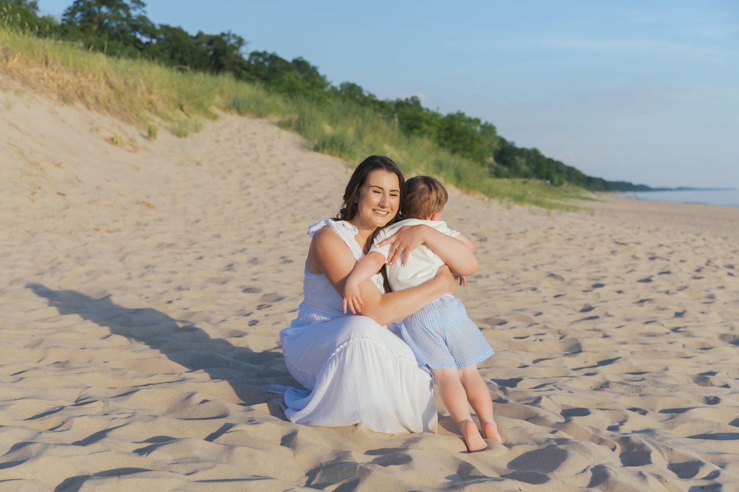 Grand Haven Michigan Beach Photography Family senior engagement photography on Lake Michigan. Grand Haven Michigan Photographer Inspiration