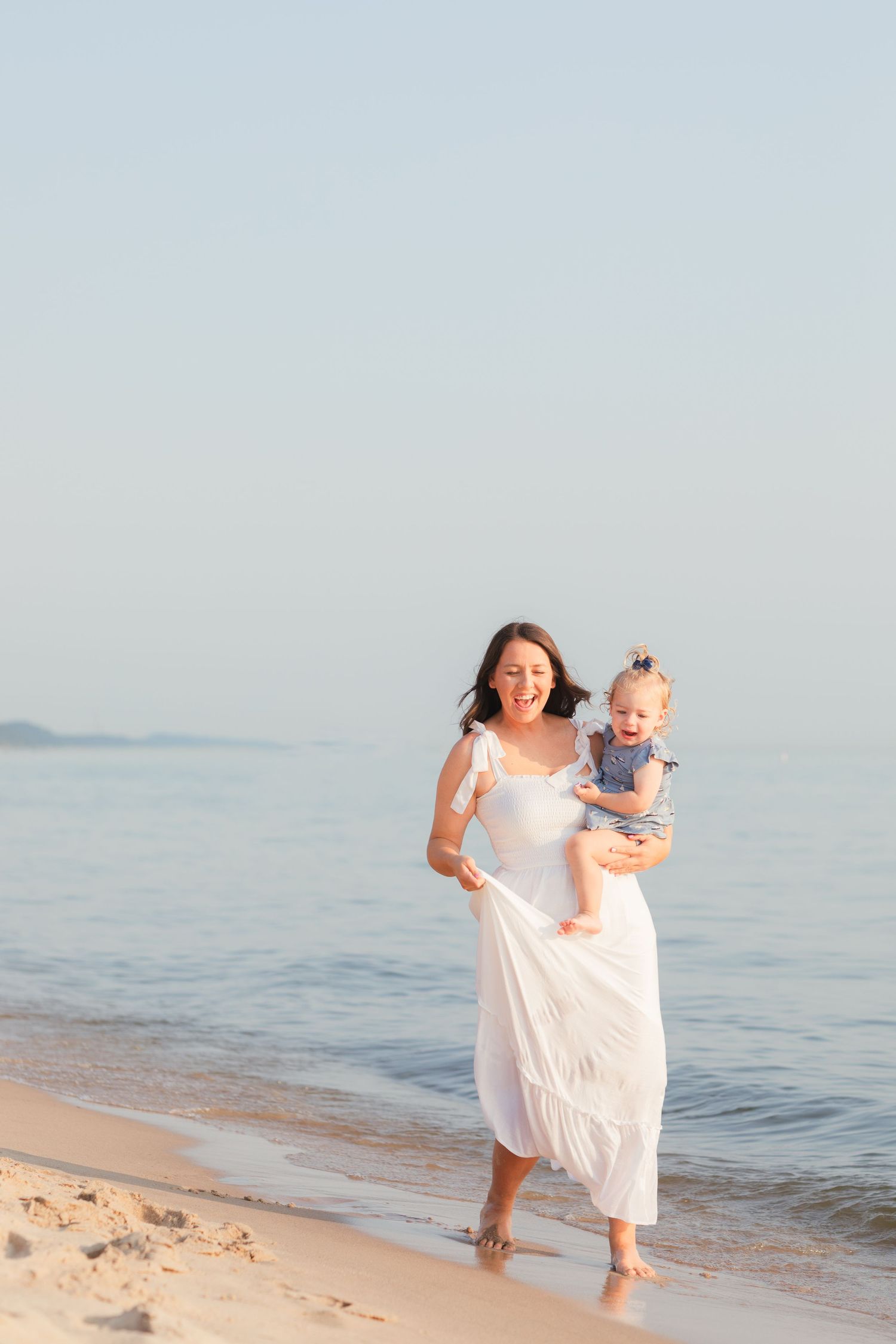 Grand Haven Michigan Beach Photography Family senior engagement photography on Lake Michigan. Grand Haven Michigan Photographer Inspiration