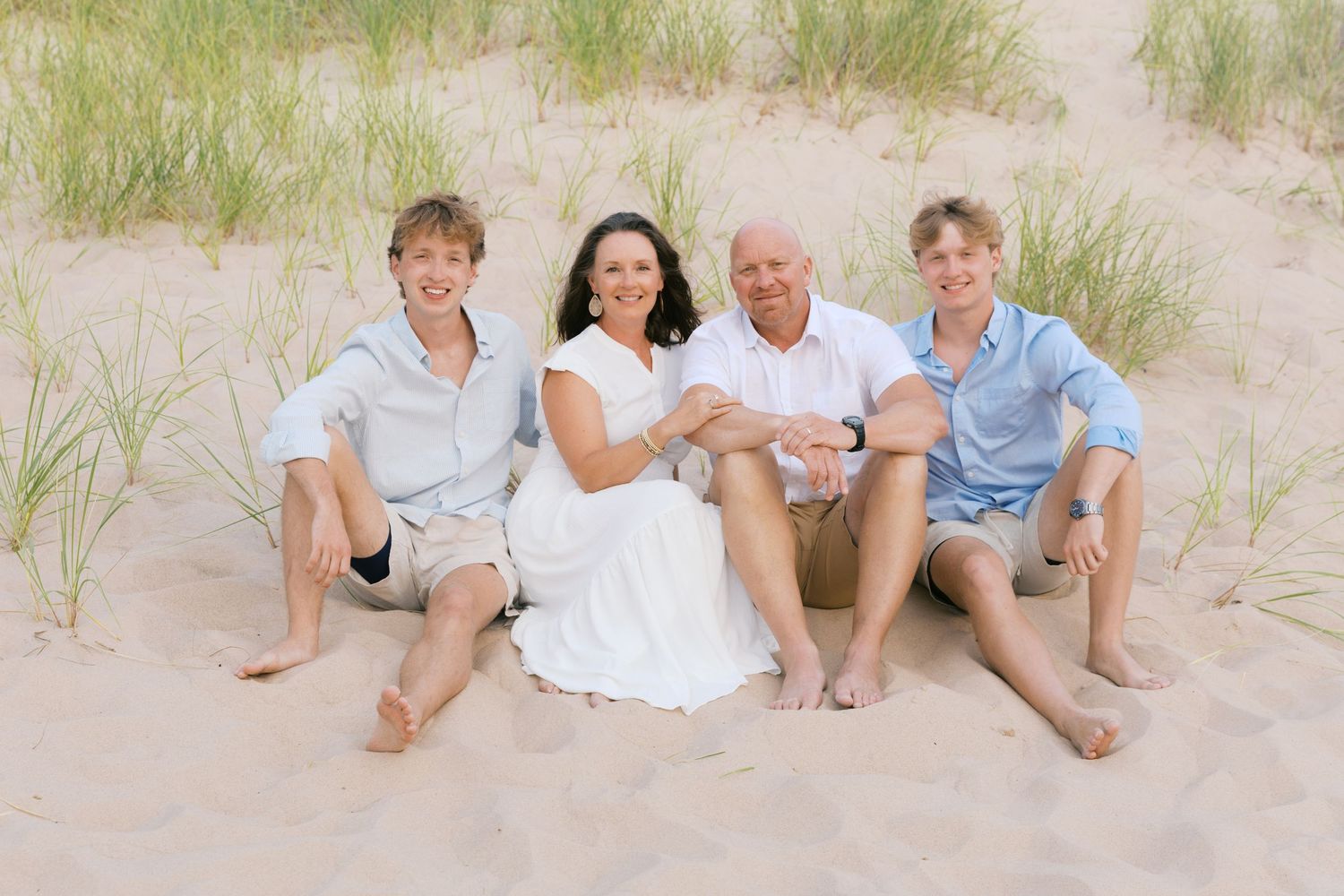 Grand Haven Michigan Beach Photography Family senior engagement photography on Lake Michigan. Grand Haven Michigan Photographer Inspiration
