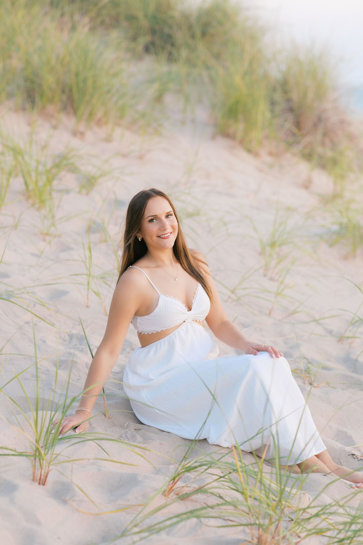 Senior Portrait Photography in Grand Haven Michigan a coastal beachtown on Lake Michigan. Beaches and downtown, sand dunes, senior year