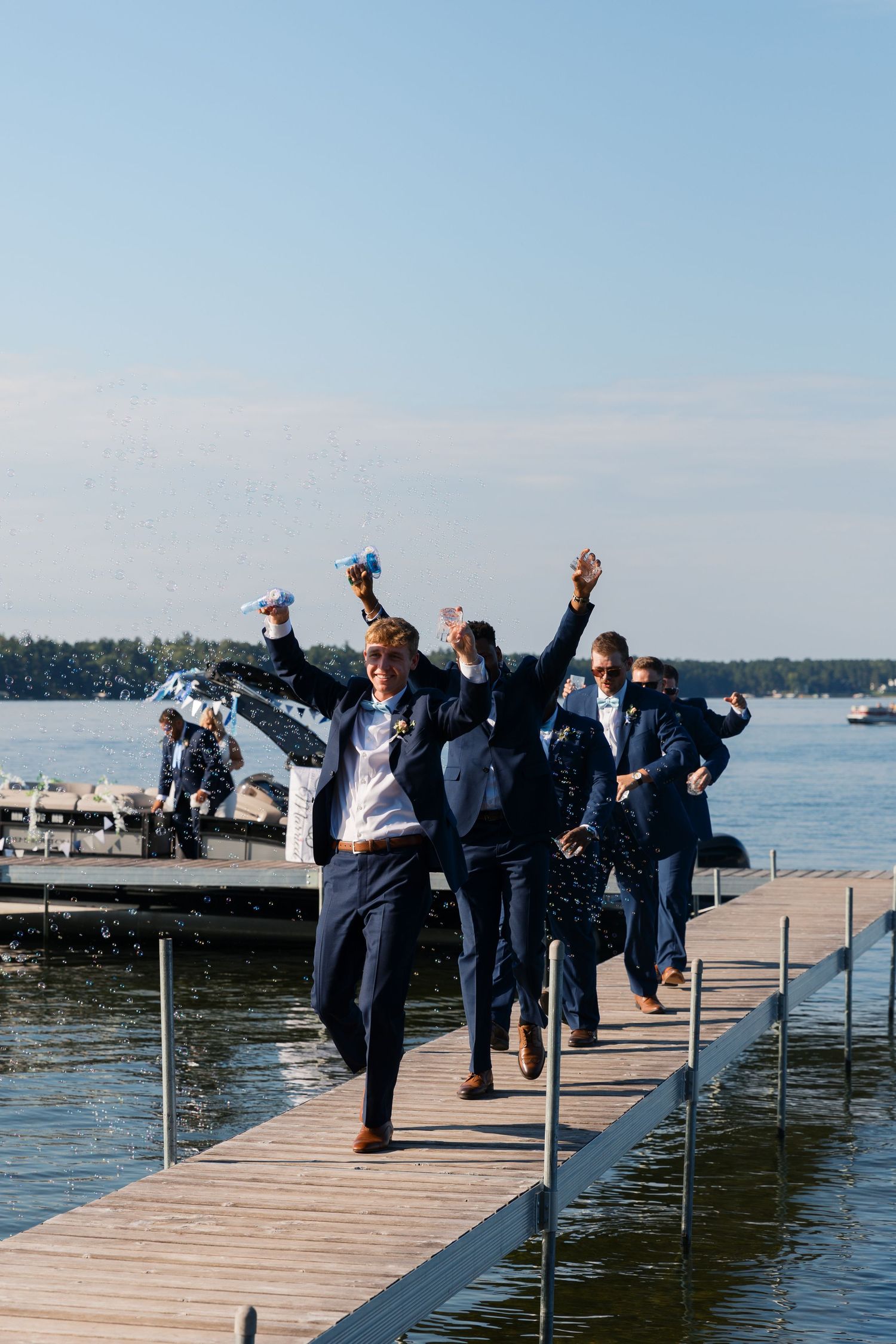 Summer Camp Themed Wedding Photography at Camp Lincoln Camp Lake Hubert in Nisswa Minnesota. Lakeside woodland wedding pictures Up North