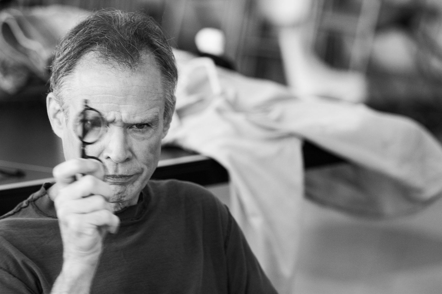 Black and white portrait series showing contemplative expressions in dramatic lighting.