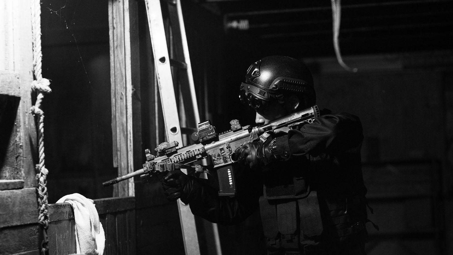 Industrial equipment and machinery parts shown in stark black and white contrast.