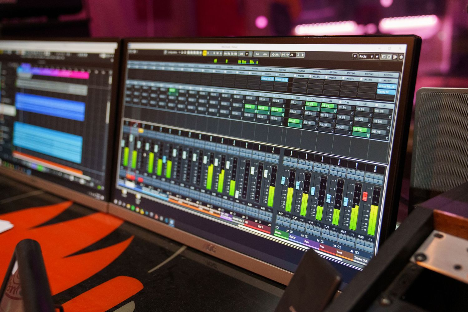 Professional digital audio workstation displays showing multiple mixing tracks.