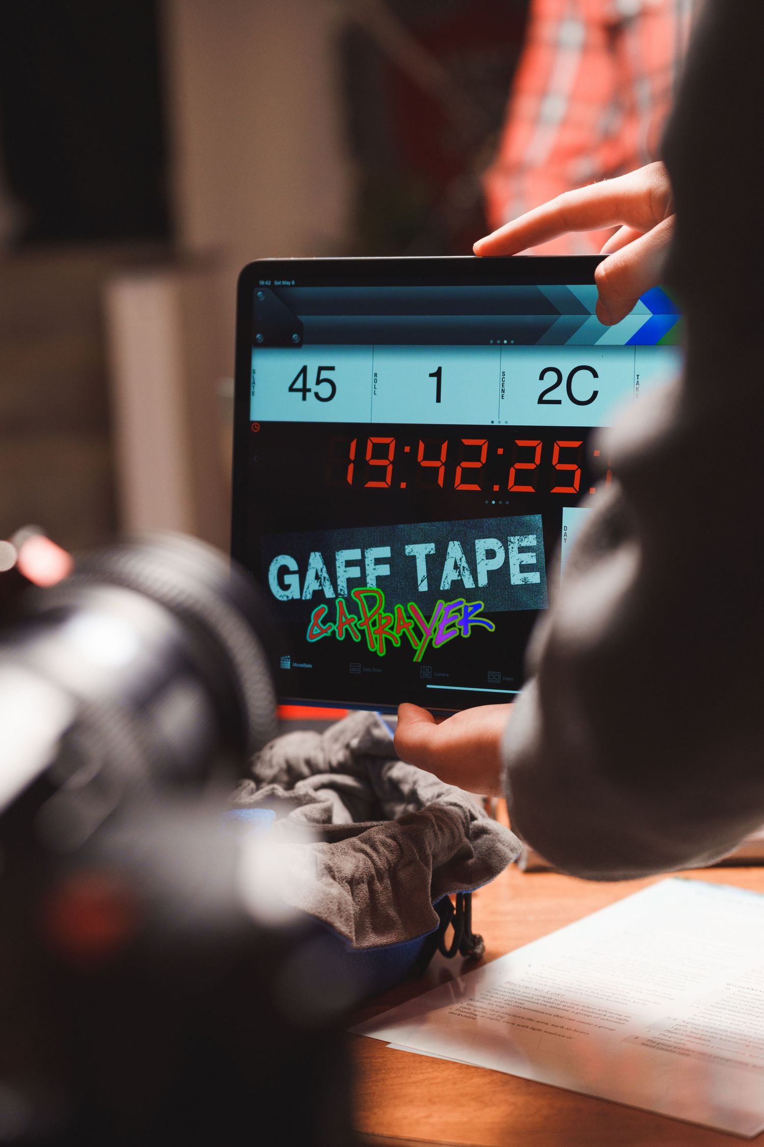 Digital recording equipment and timecode displays in a music studio setup.