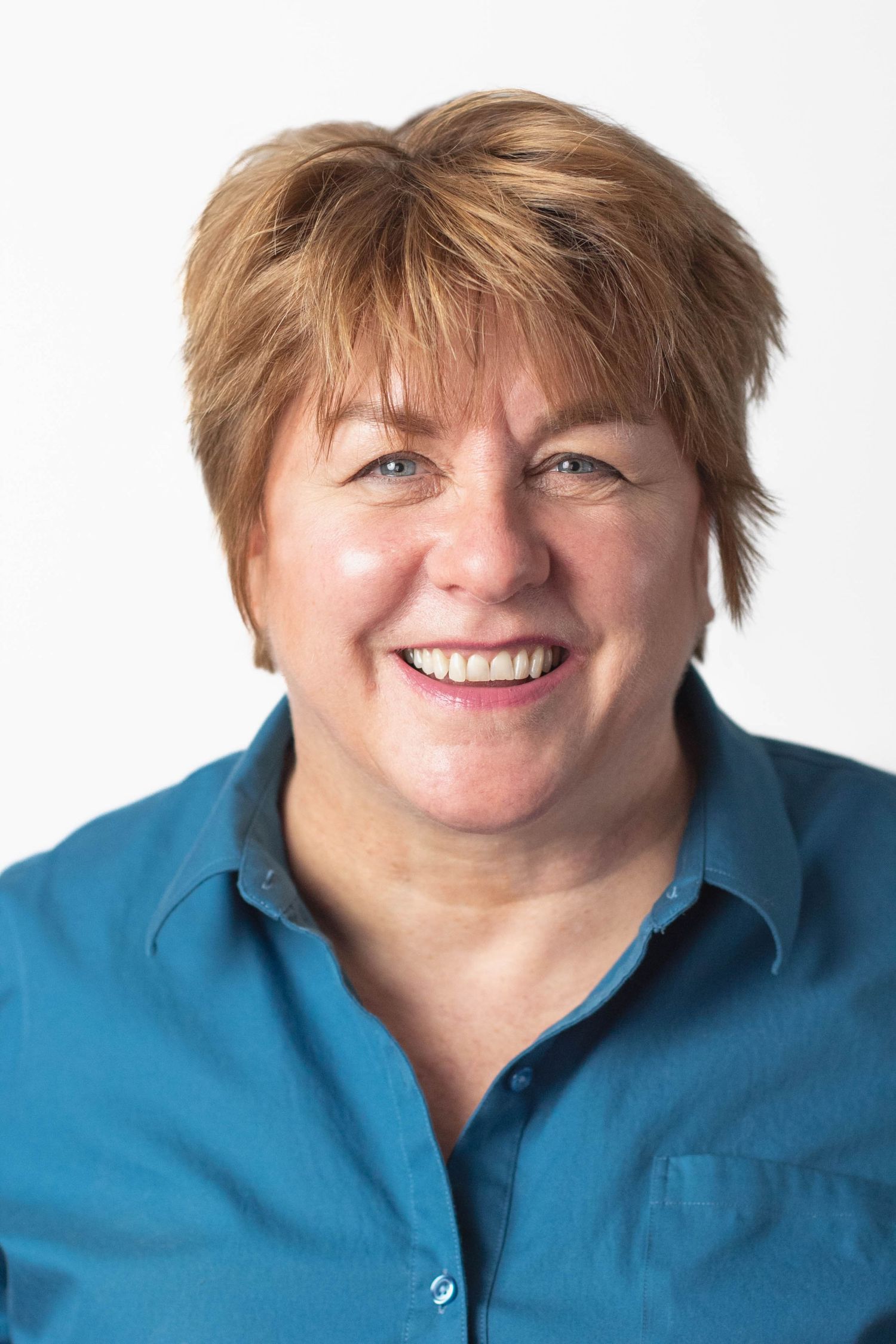 A sequence of portraits showing someone in a blue button-down shirt with short hair against white backdrop.