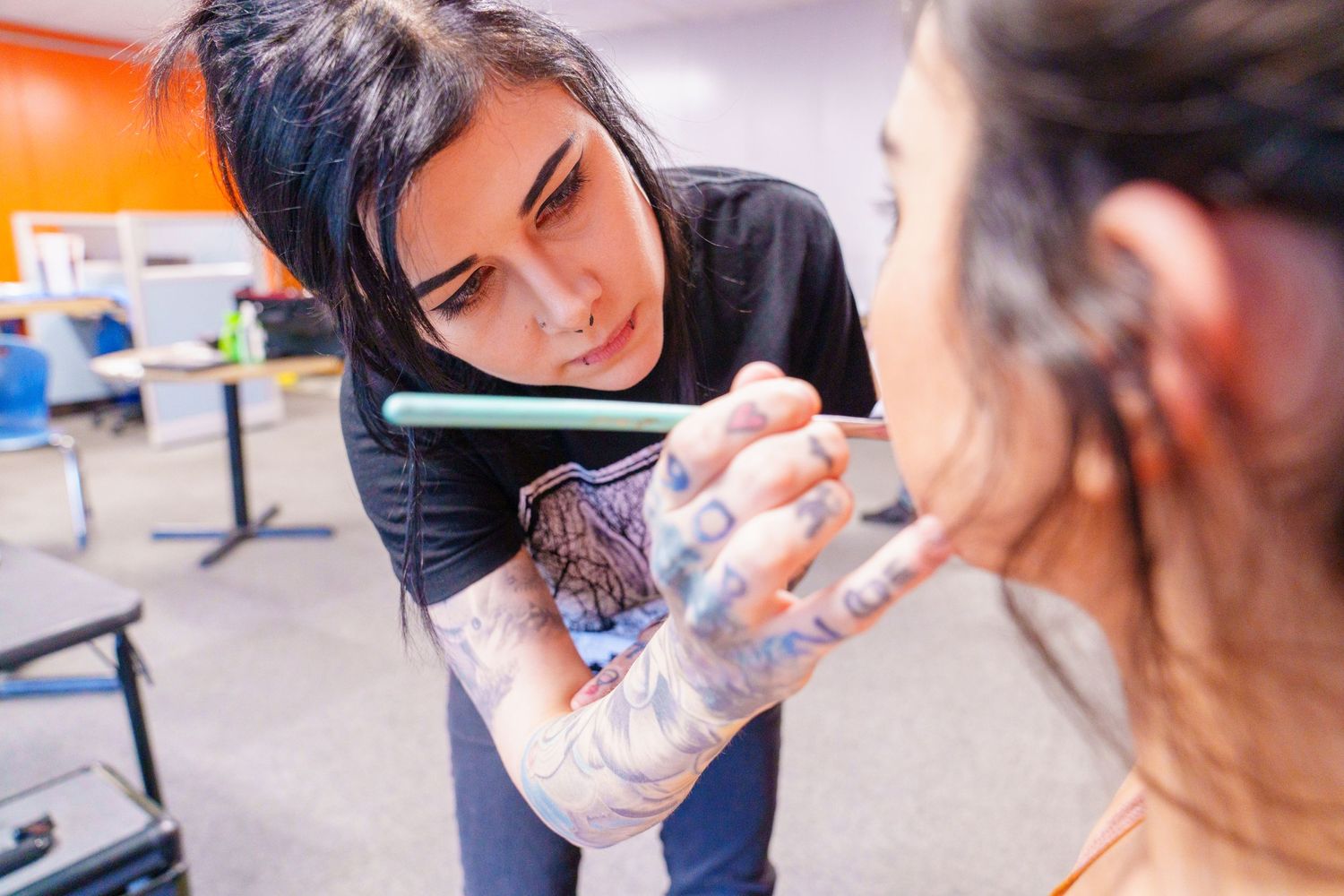 Close-up shots showing someone working with detailed focus and concentration.