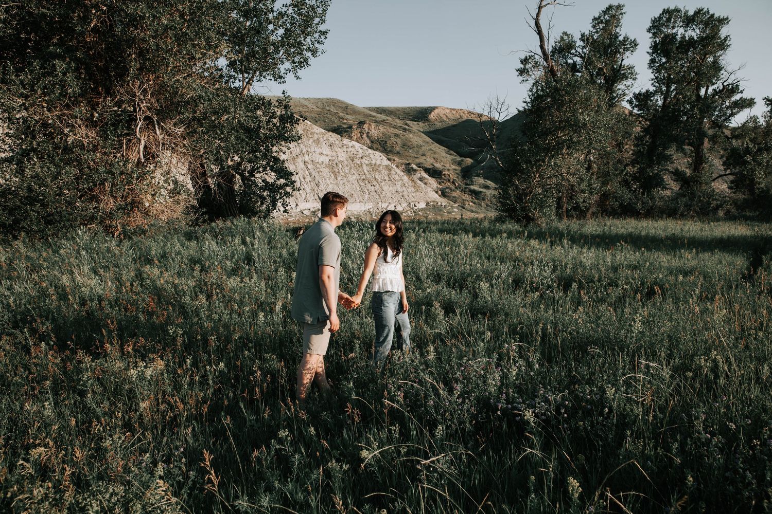 wedding and engagement photographers in lethbridge alberta - couples engagement session shot in west lethbridge at popson park alberta