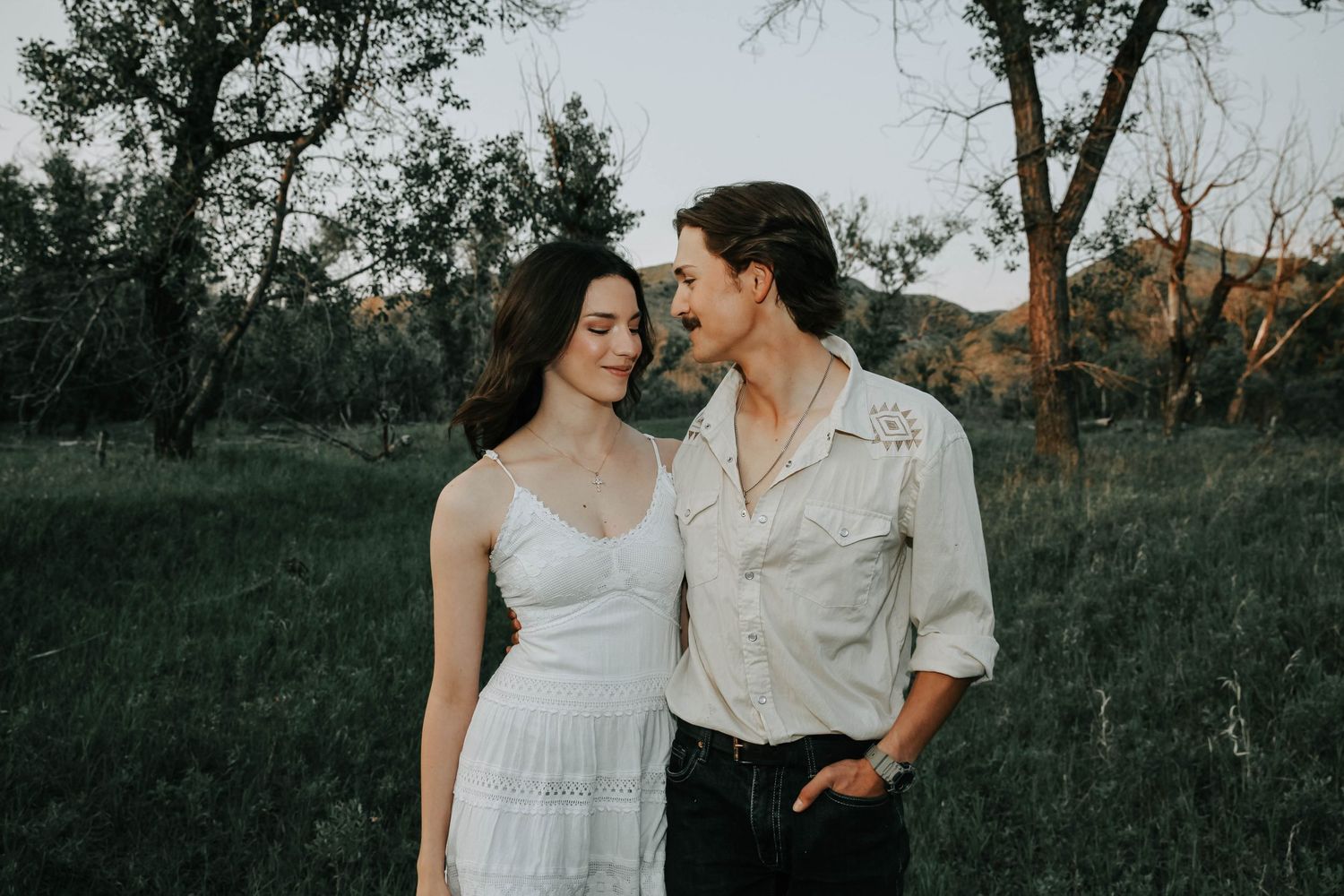 an engaged couple getting engagement photos in lethbridge alberta with engagement and wedding photographer allie cooke photography