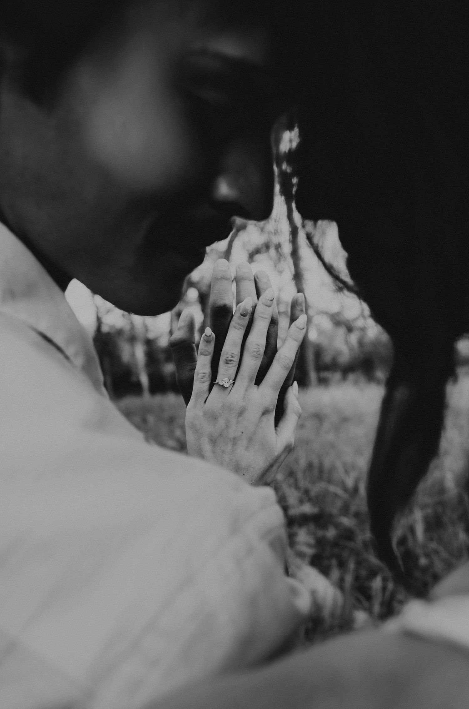 an engaged couple getting engagement photos in lethbridge alberta with engagement and wedding photographer allie cooke photography