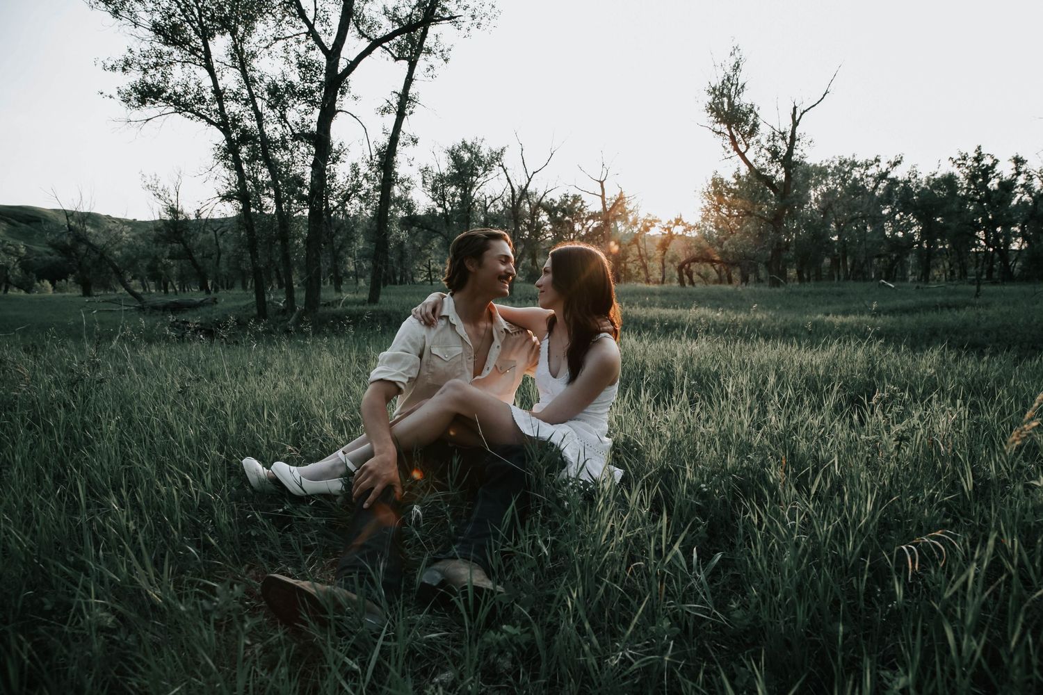 couples photographer taking engagement photos in lethbridge alberta with an engaged couple - complimentary engagement sessions with booking