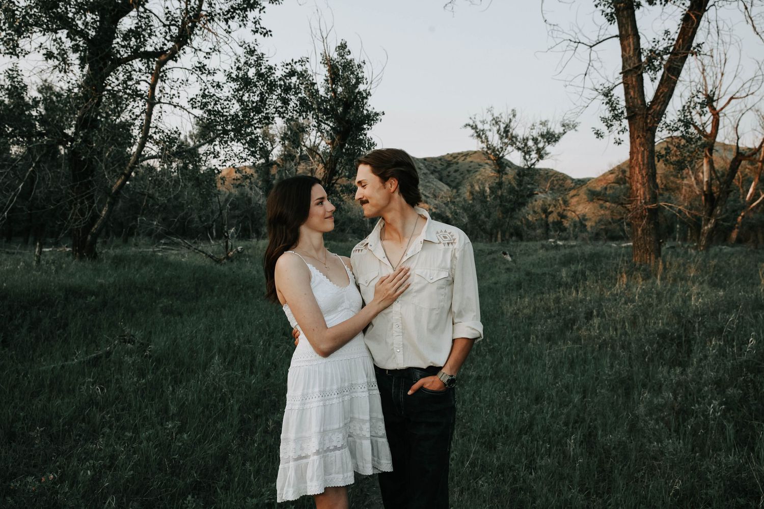 couples photographer taking engagement photos in lethbridge alberta with an engaged couple - complimentary engagement sessions with booking