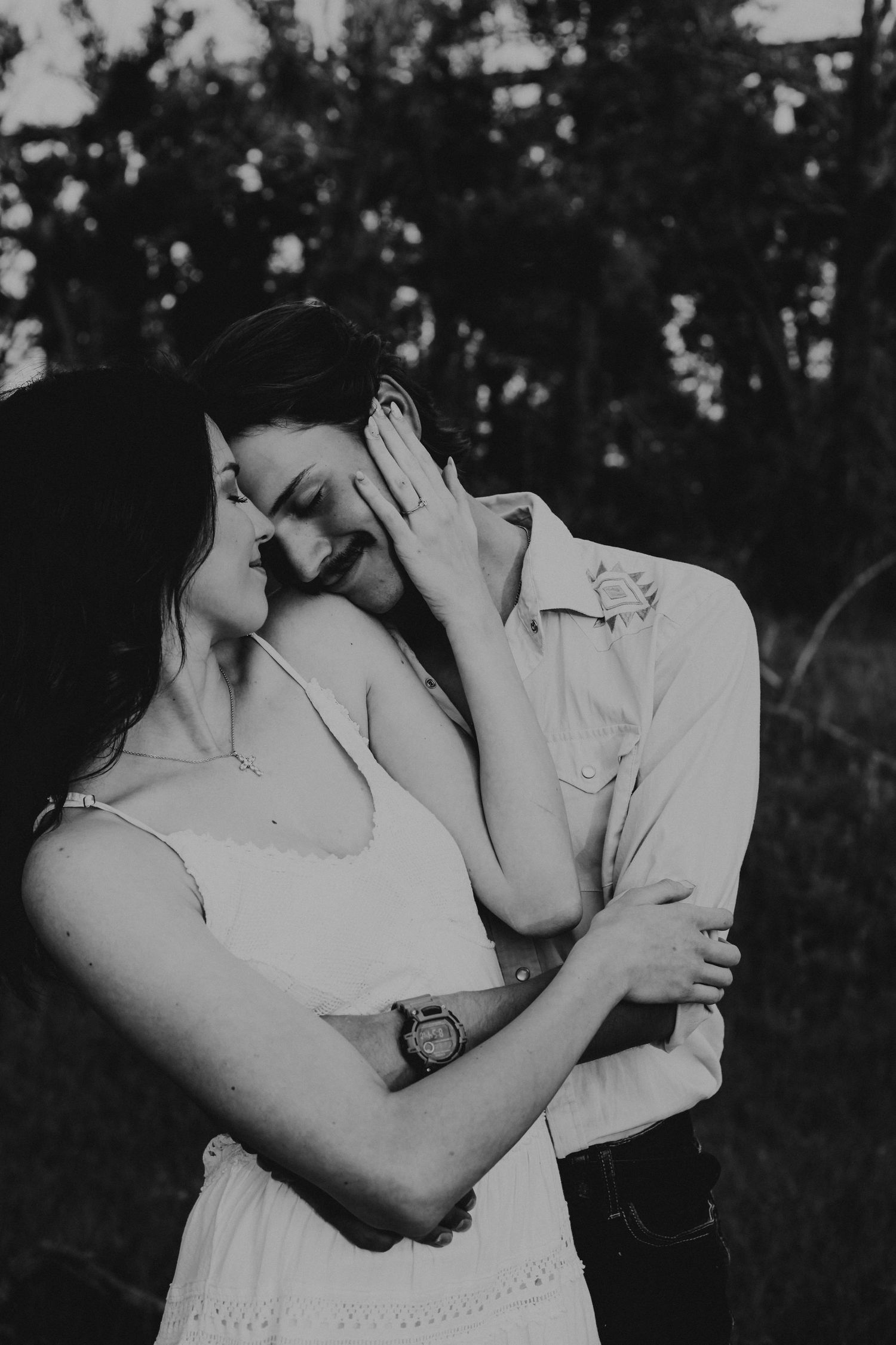 couples photographer taking engagement photos in lethbridge alberta with an engaged couple - complimentary engagement sessions with booking