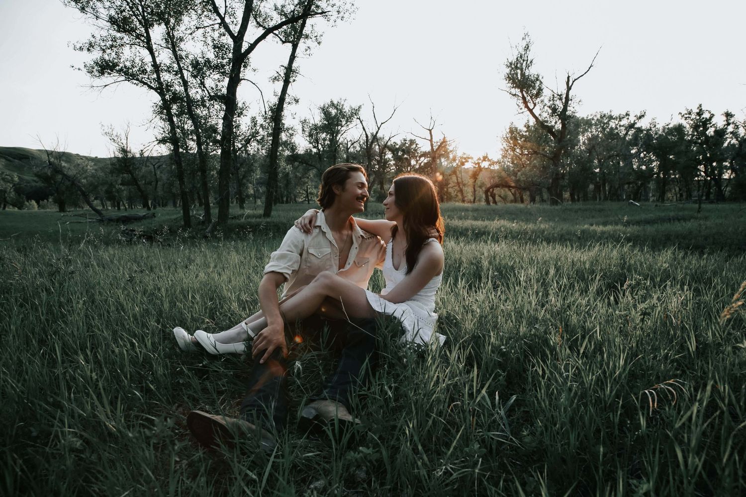 an engaged couple getting engagement photos in lethbridge alberta with engagement and wedding photographer allie cooke photography