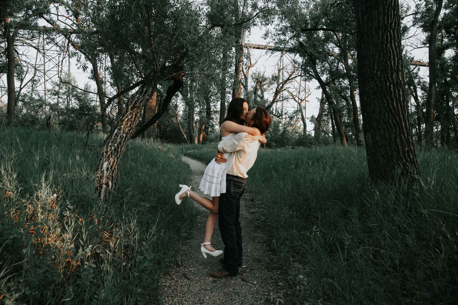 an engaged couple getting engagement photos in lethbridge alberta with engagement and wedding photographer allie cooke photography