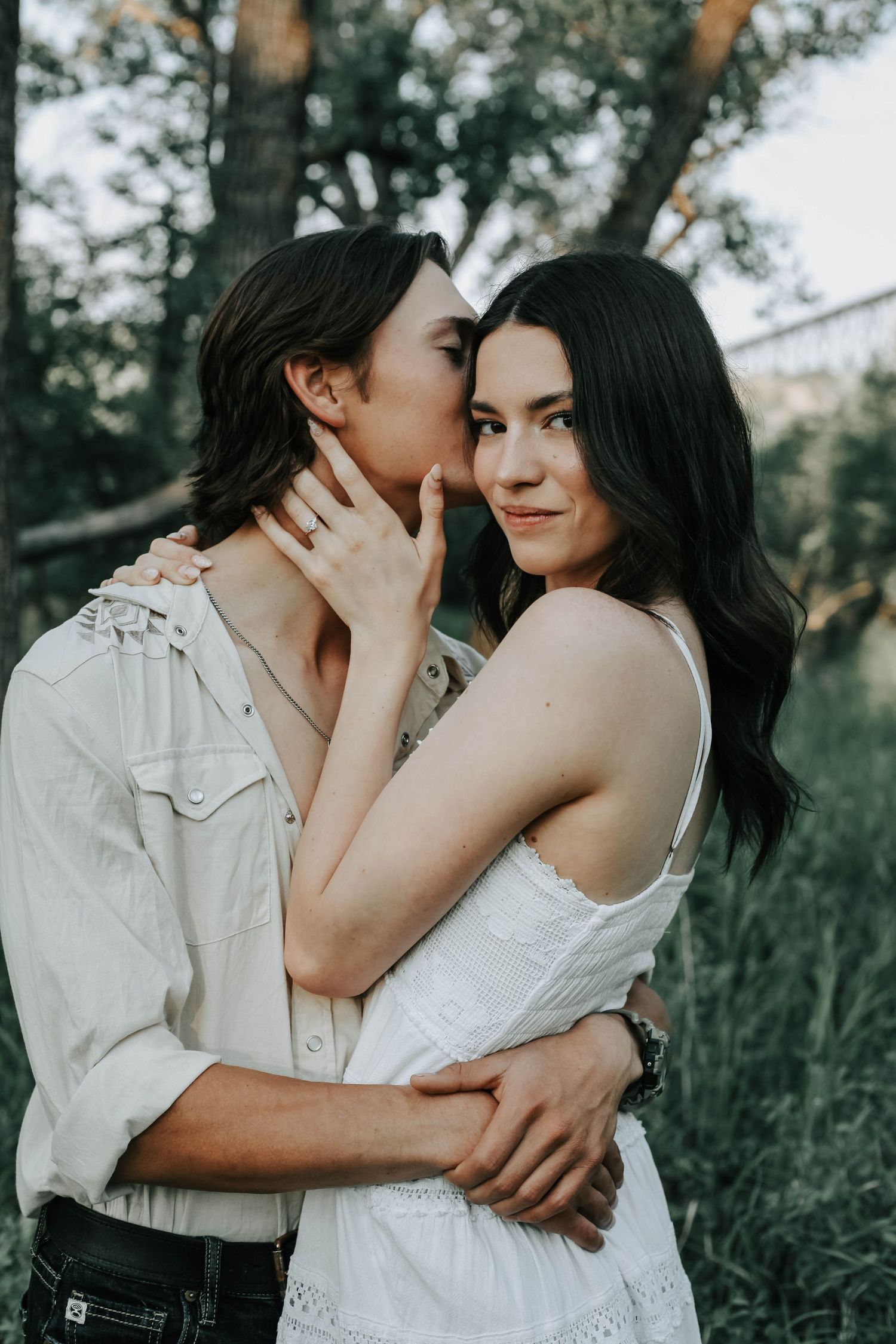 an engaged couple getting engagement photos in lethbridge alberta with engagement and wedding photographer allie cooke photography