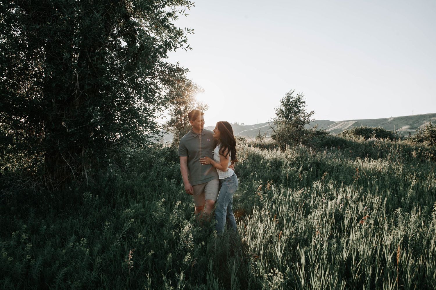 wedding and engagement photographers in lethbridge alberta - couples engagement session shot in west lethbridge at popson park alberta