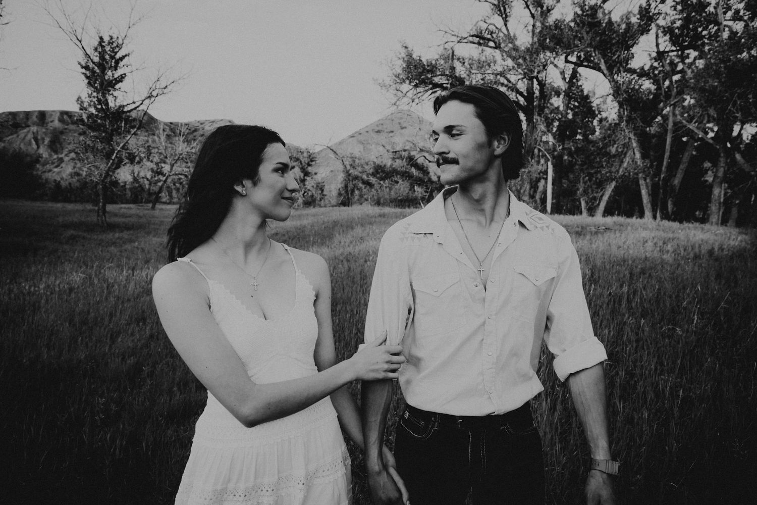 an engaged couple getting engagement photos in lethbridge alberta with engagement and wedding photographer allie cooke photography