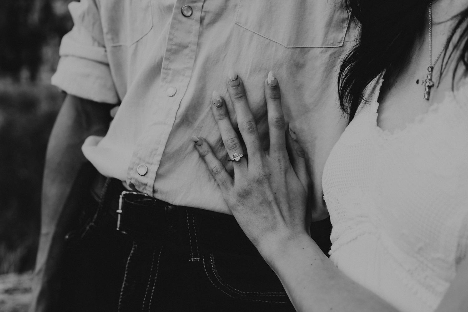 an engaged couple getting engagement photos in lethbridge alberta with engagement and wedding photographer allie cooke photography