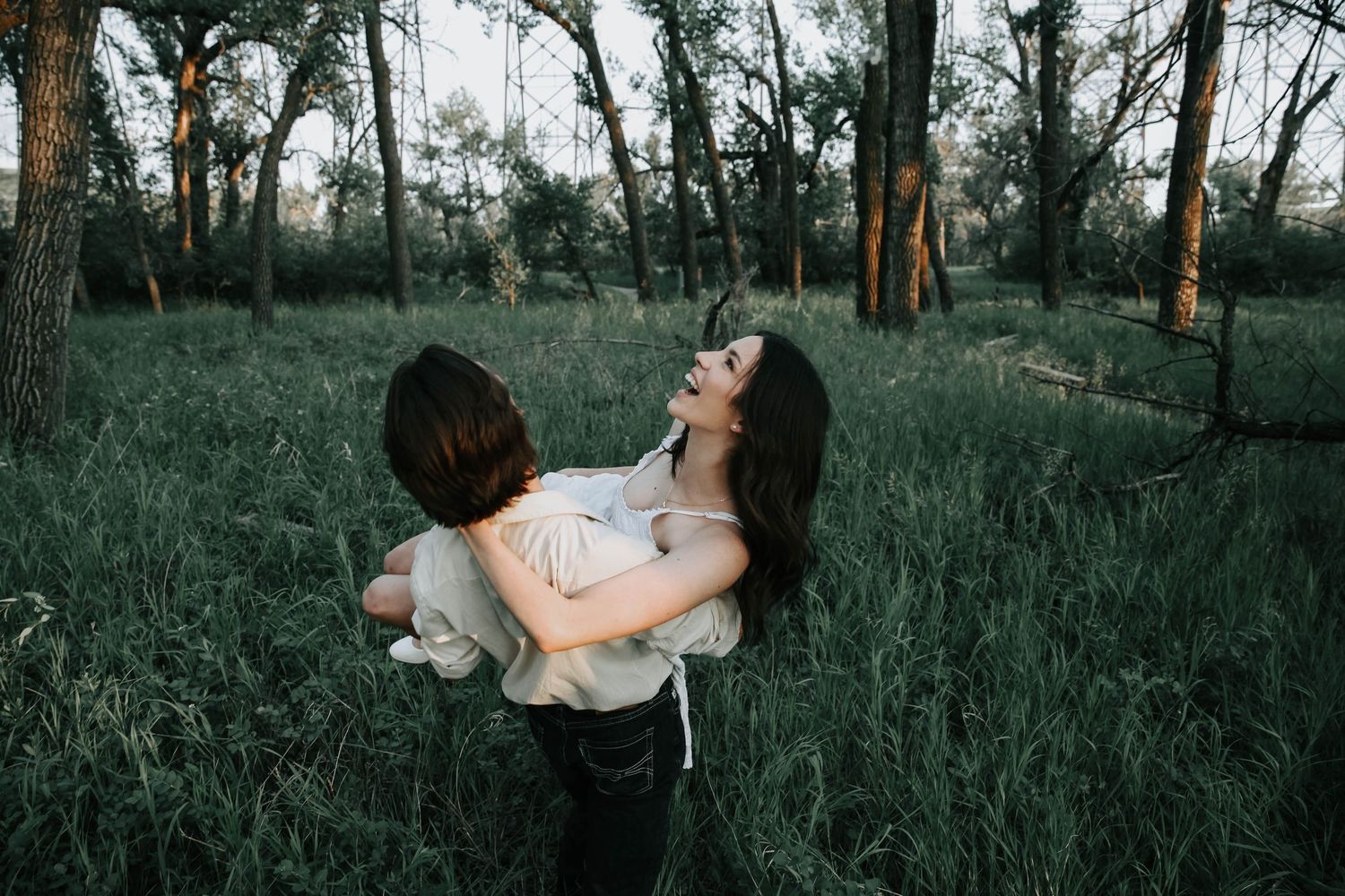 couples photographer taking engagement photos in lethbridge alberta with an engaged couple - complimentary engagement sessions with booking