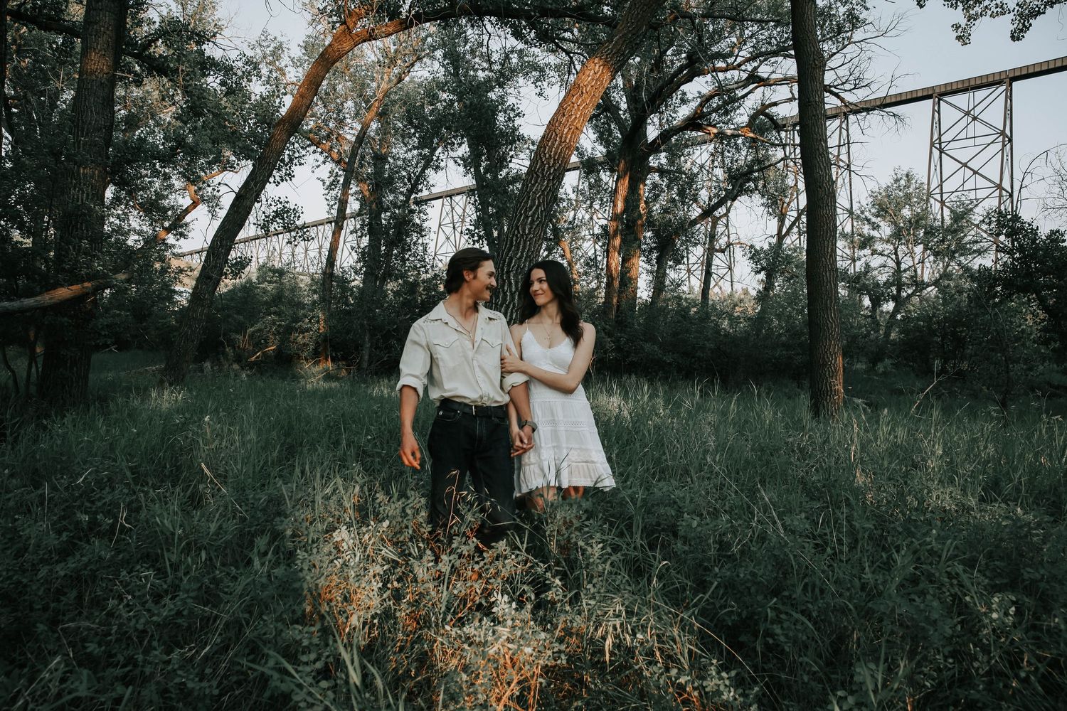couples photographer taking engagement photos in lethbridge alberta with an engaged couple - complimentary engagement sessions with booking