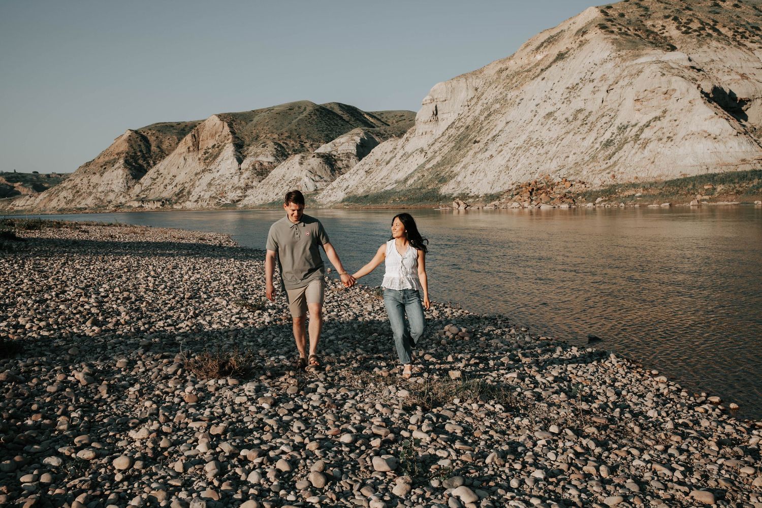 wedding and engagement photographers in lethbridge alberta - couples engagement session shot in west lethbridge at popson park alberta
