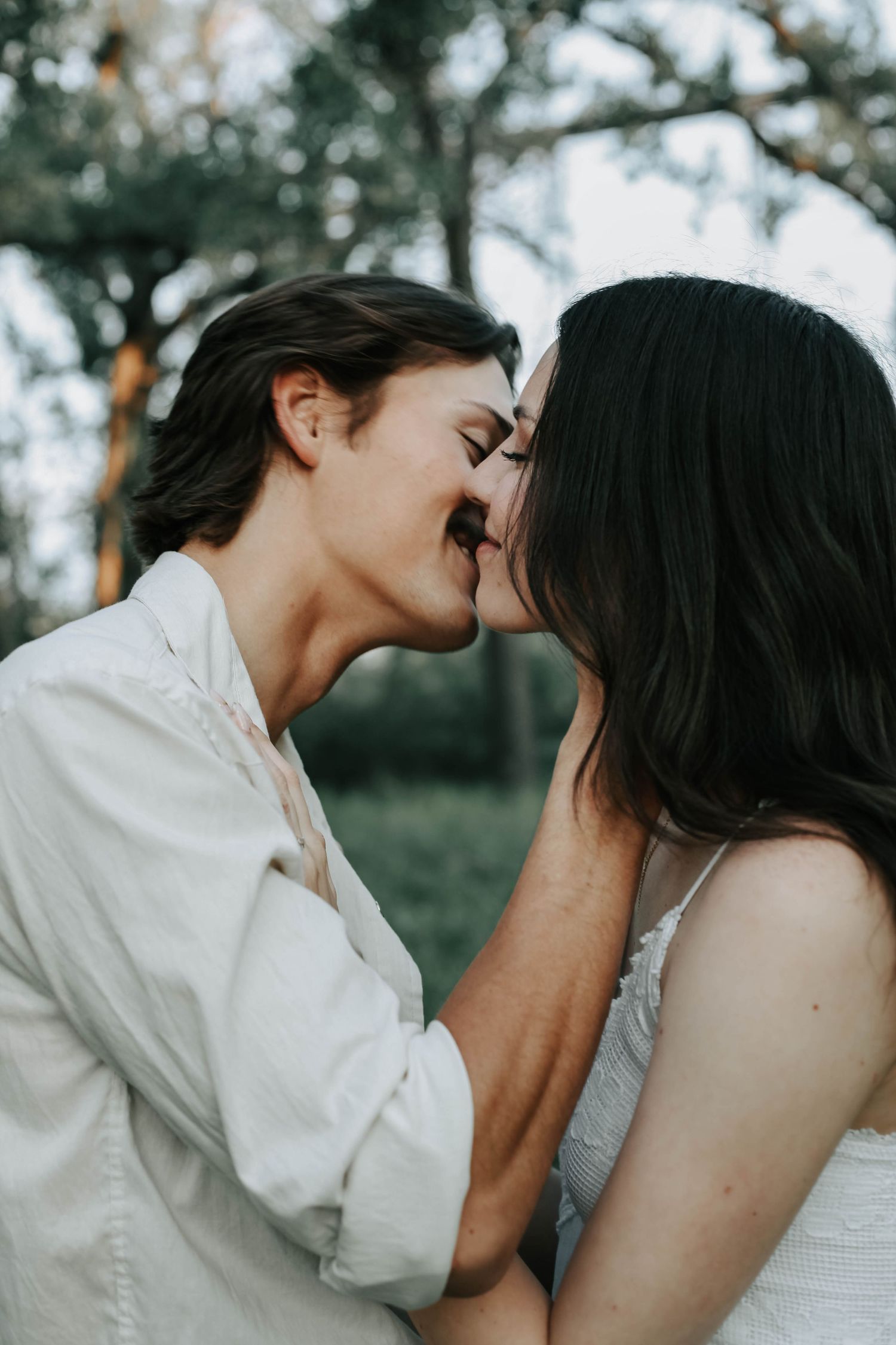 an engaged couple getting engagement photos in lethbridge alberta with engagement and wedding photographer allie cooke photography