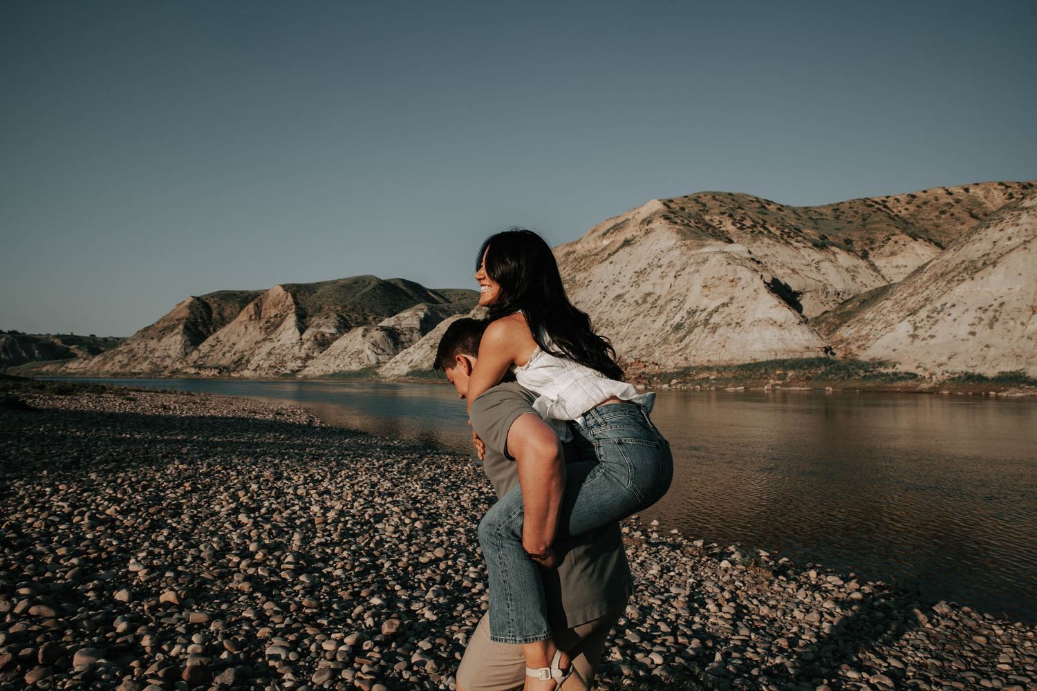 wedding and engagement photographers in lethbridge alberta - couples engagement session shot in west lethbridge at popson park alberta