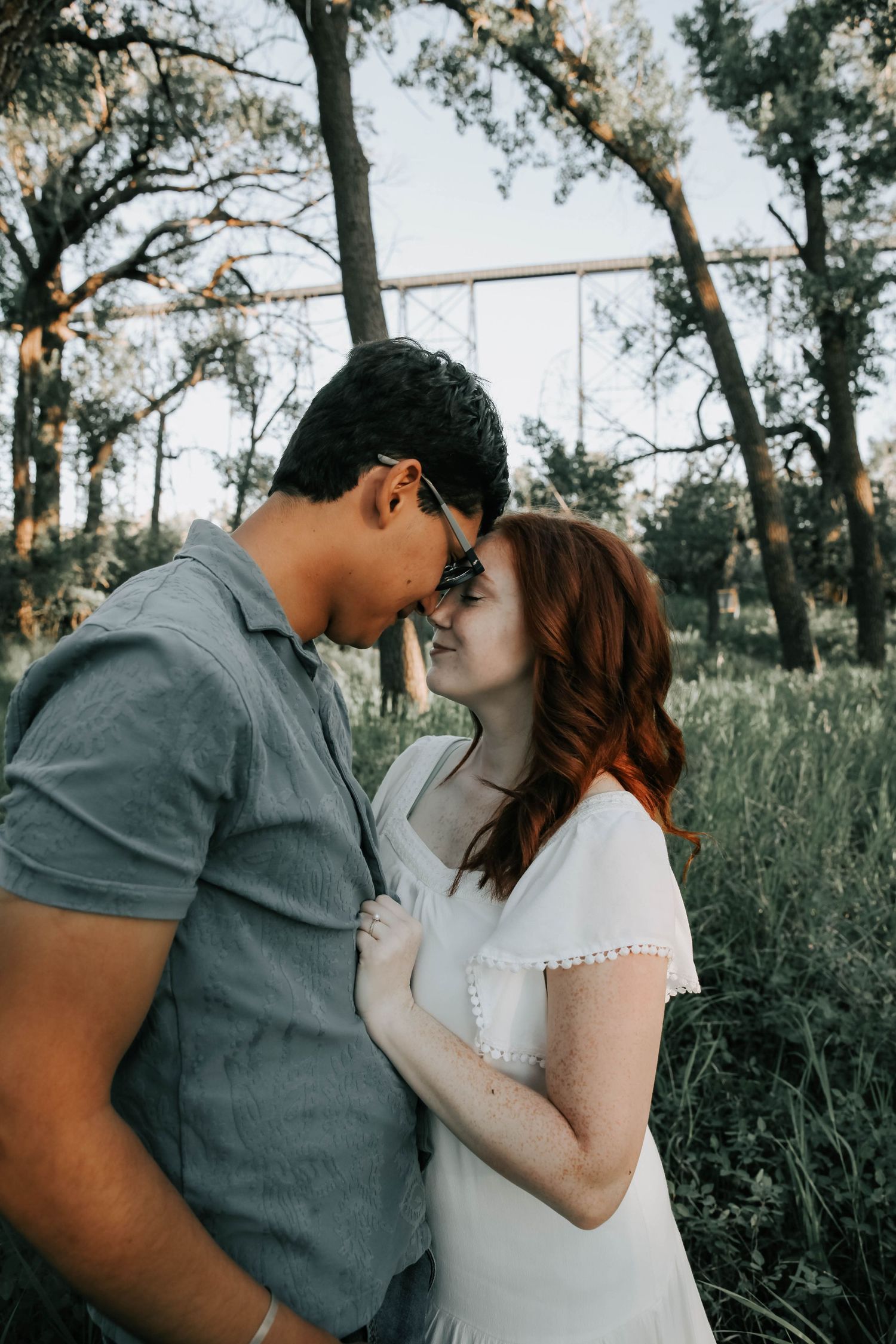 couples photographer taking engagement photos in lethbridge alberta with an engaged couple - complimentary engagement sessions with booking