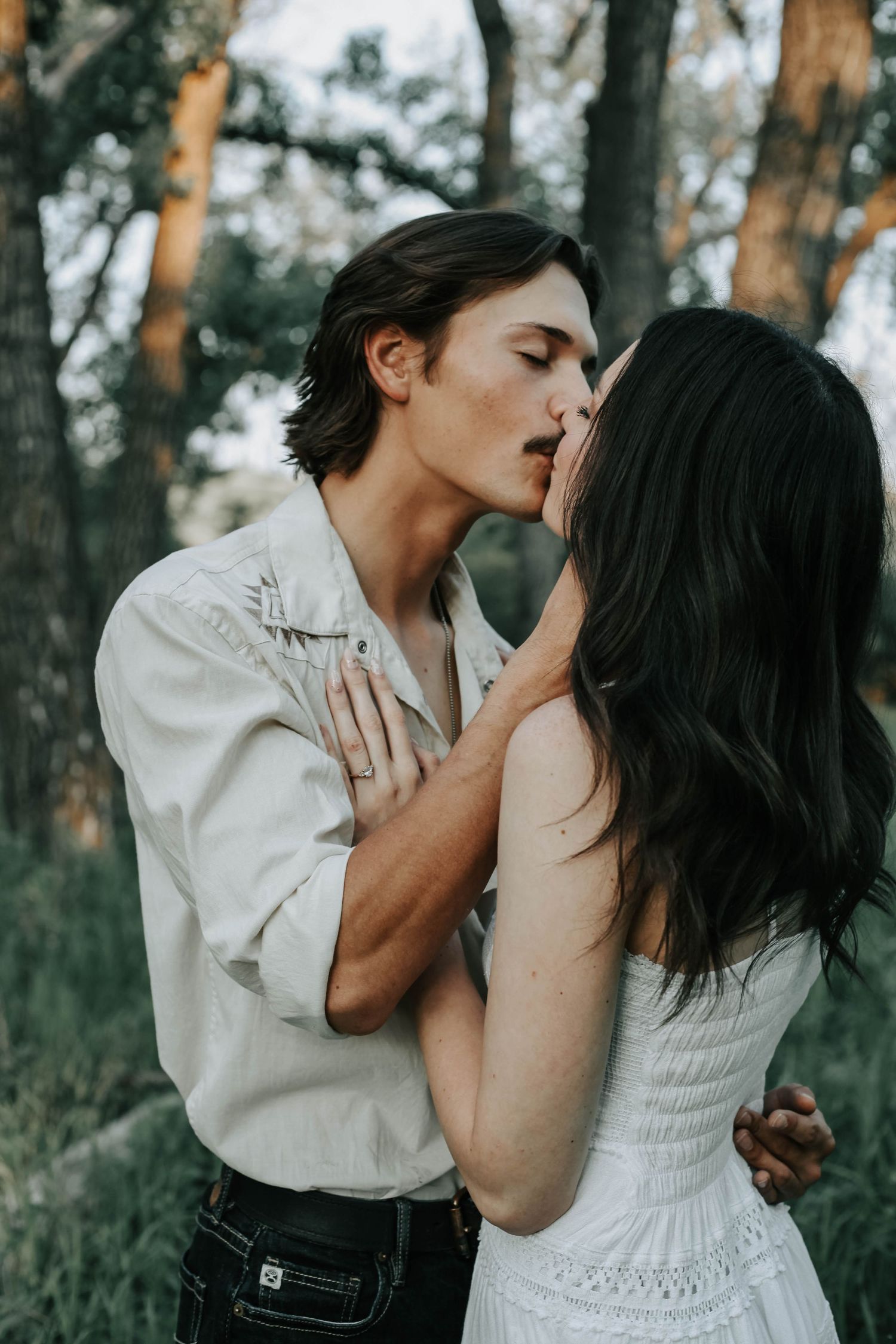 an engaged couple getting engagement photos in lethbridge alberta with engagement and wedding photographer allie cooke photography