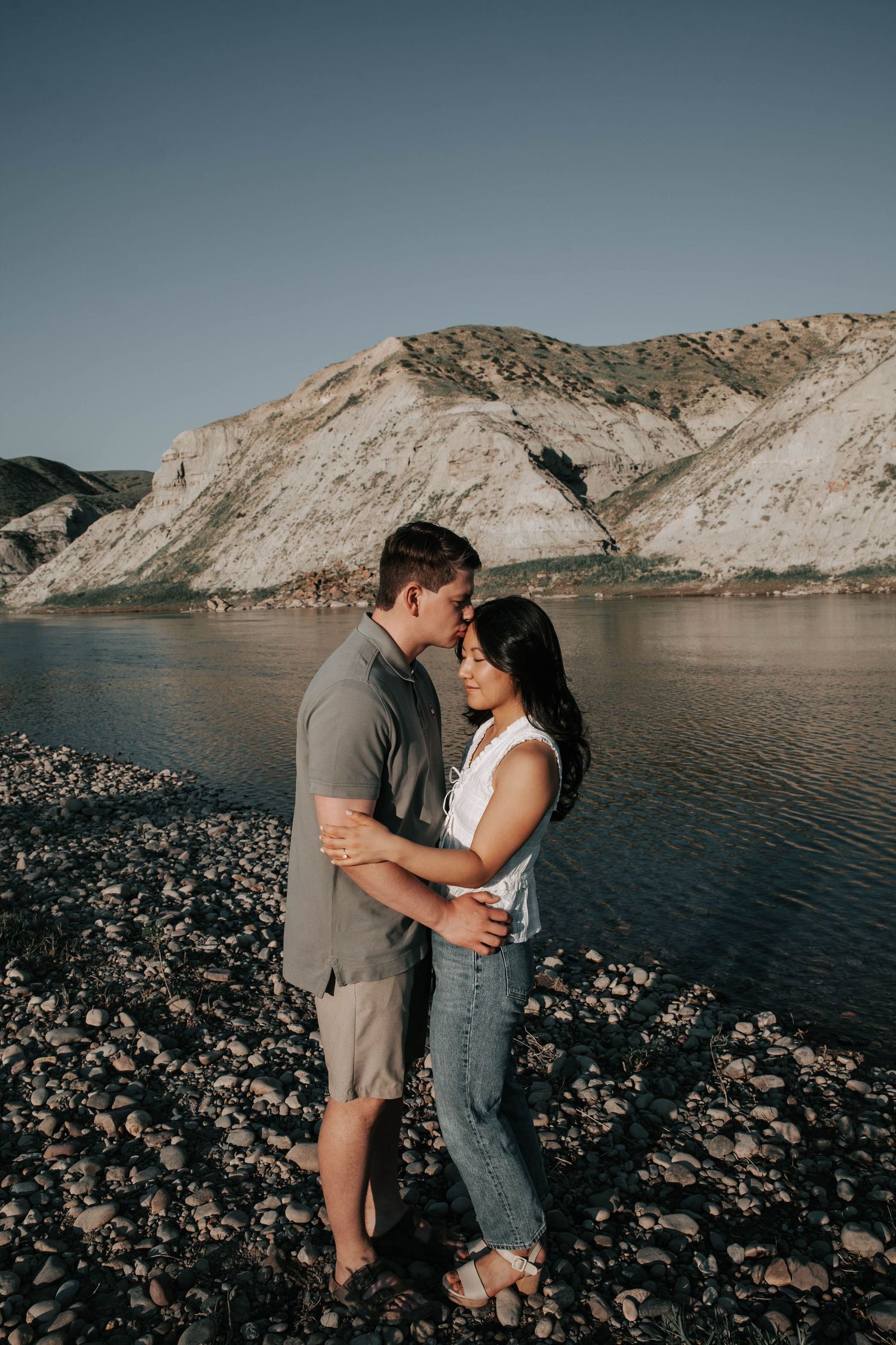 wedding and engagement photographers in lethbridge alberta - couples engagement session shot in west lethbridge at popson park alberta