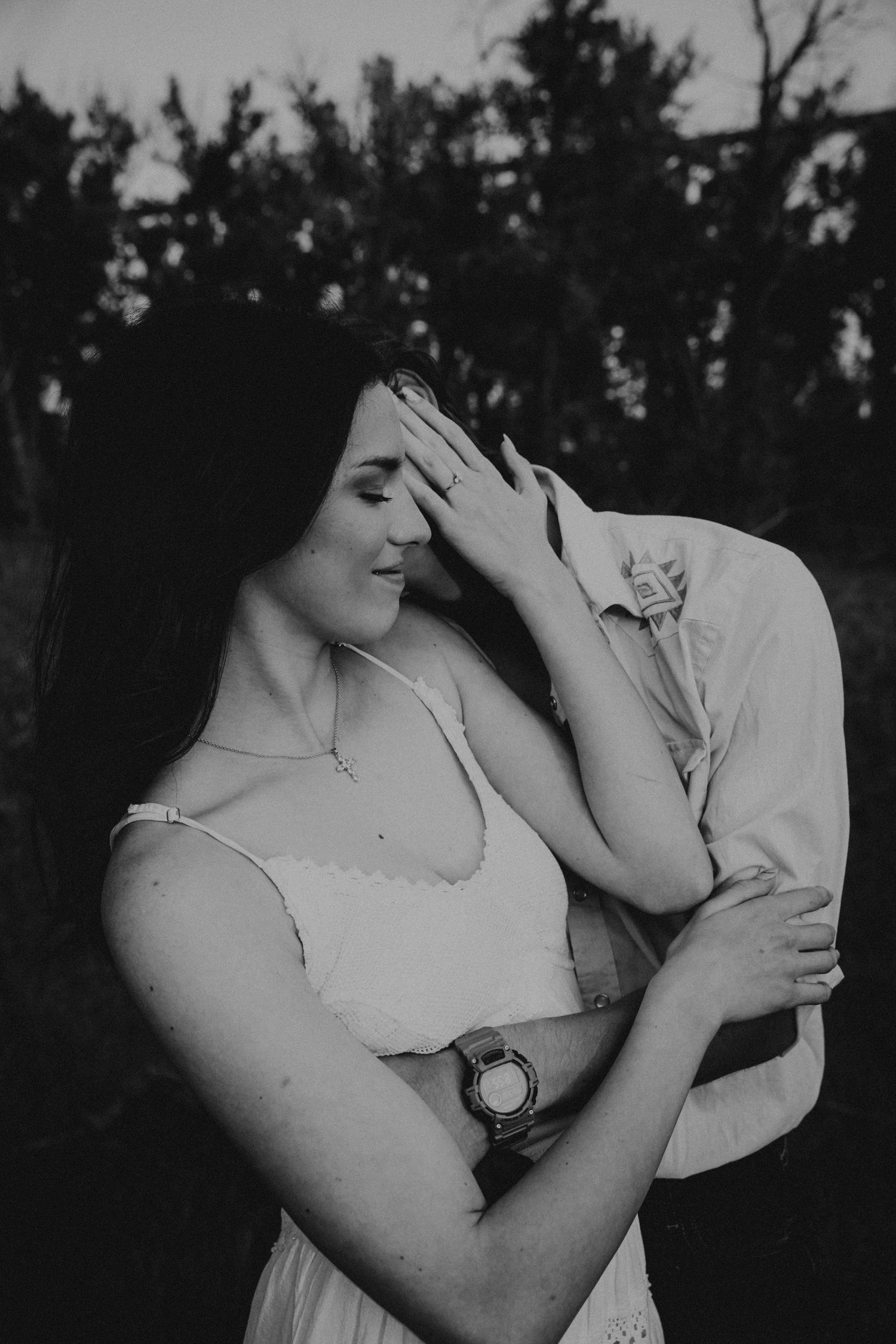 an engaged couple getting engagement photos in lethbridge alberta with engagement and wedding photographer allie cooke photography