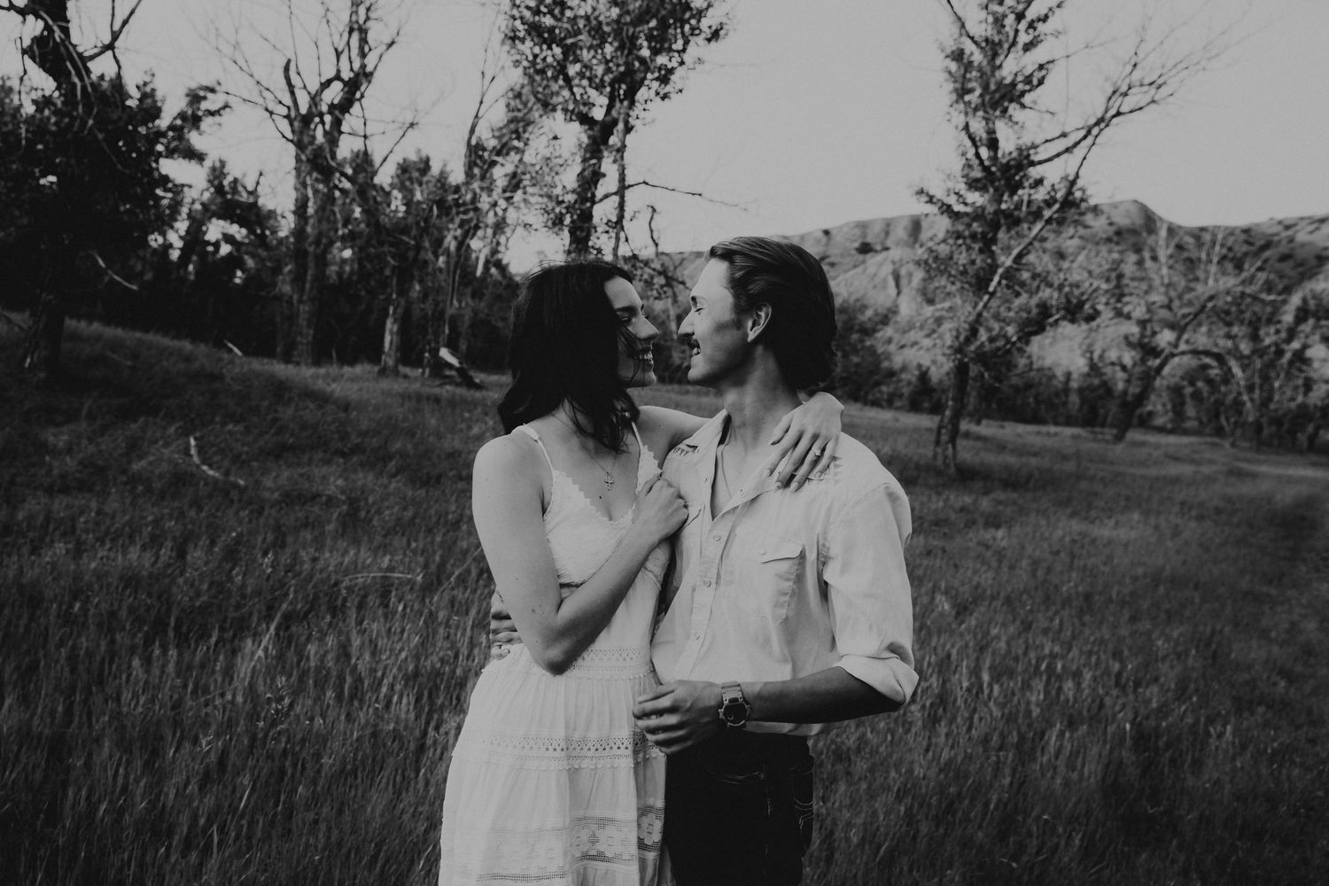 an engaged couple getting engagement photos in lethbridge alberta with engagement and wedding photographer allie cooke photography