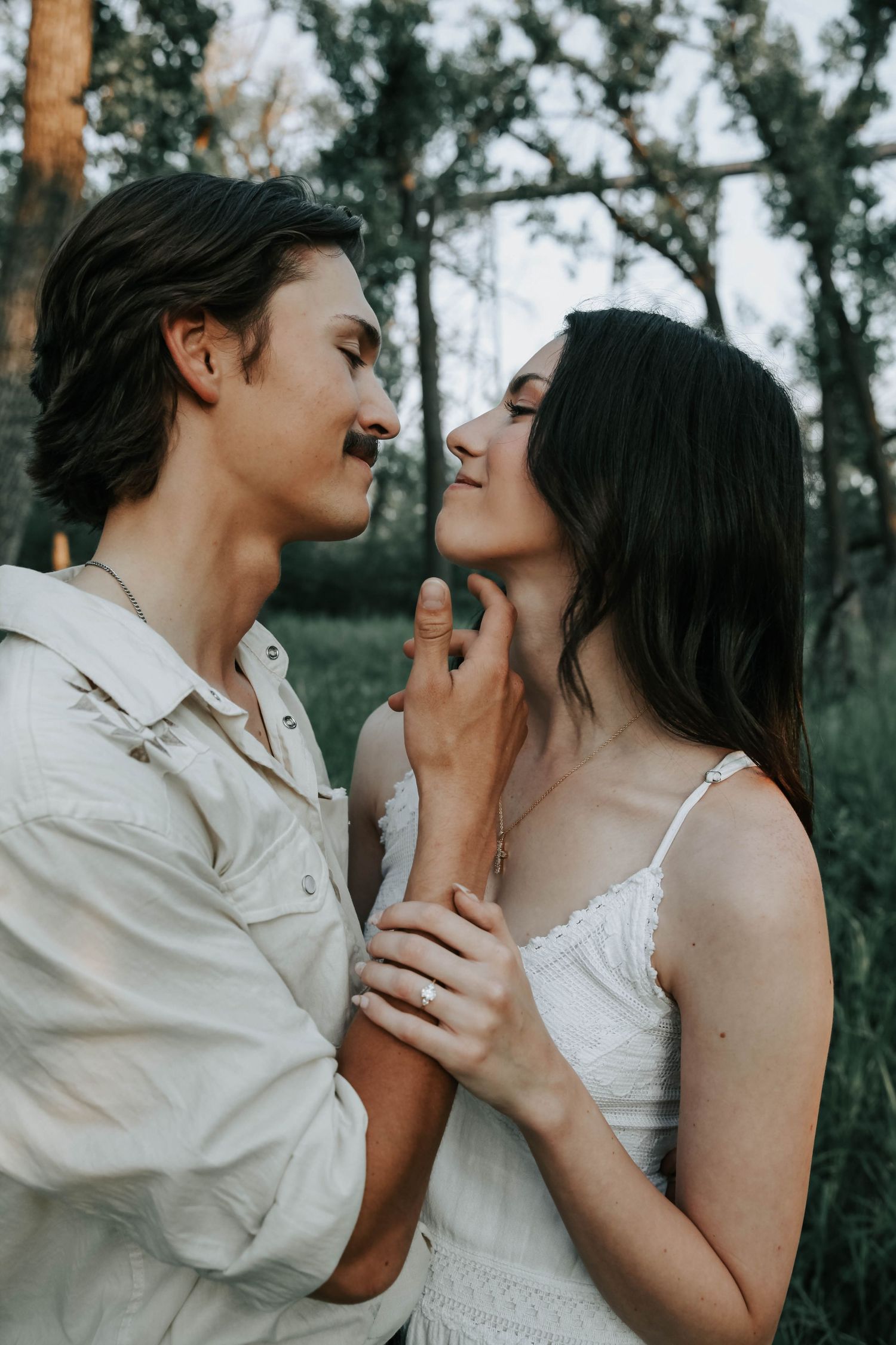 an engaged couple getting engagement photos in lethbridge alberta with engagement and wedding photographer allie cooke photography