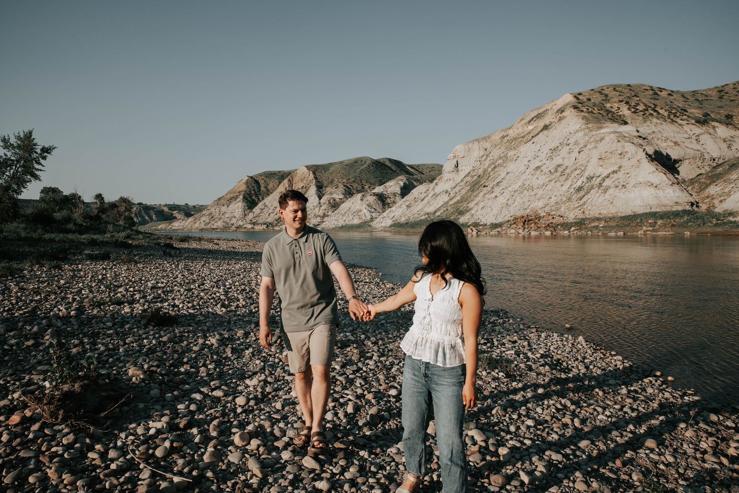 wedding and engagement photographers in lethbridge alberta - couples engagement session shot in west lethbridge at popson park alberta