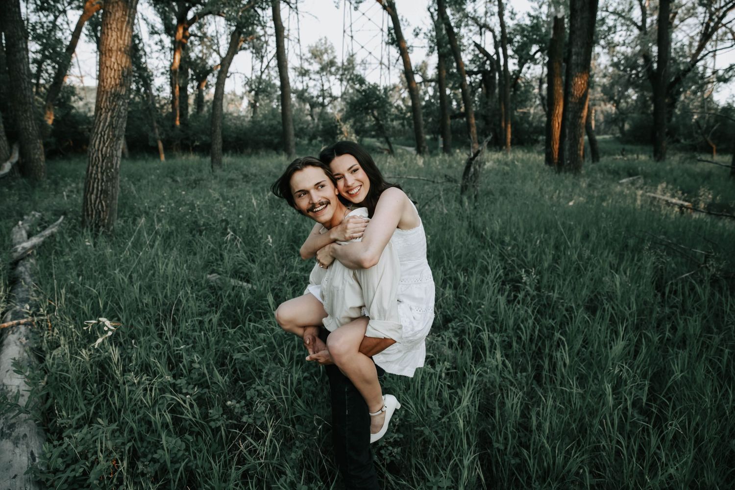couples photographer taking engagement photos in lethbridge alberta with an engaged couple - complimentary engagement sessions with booking