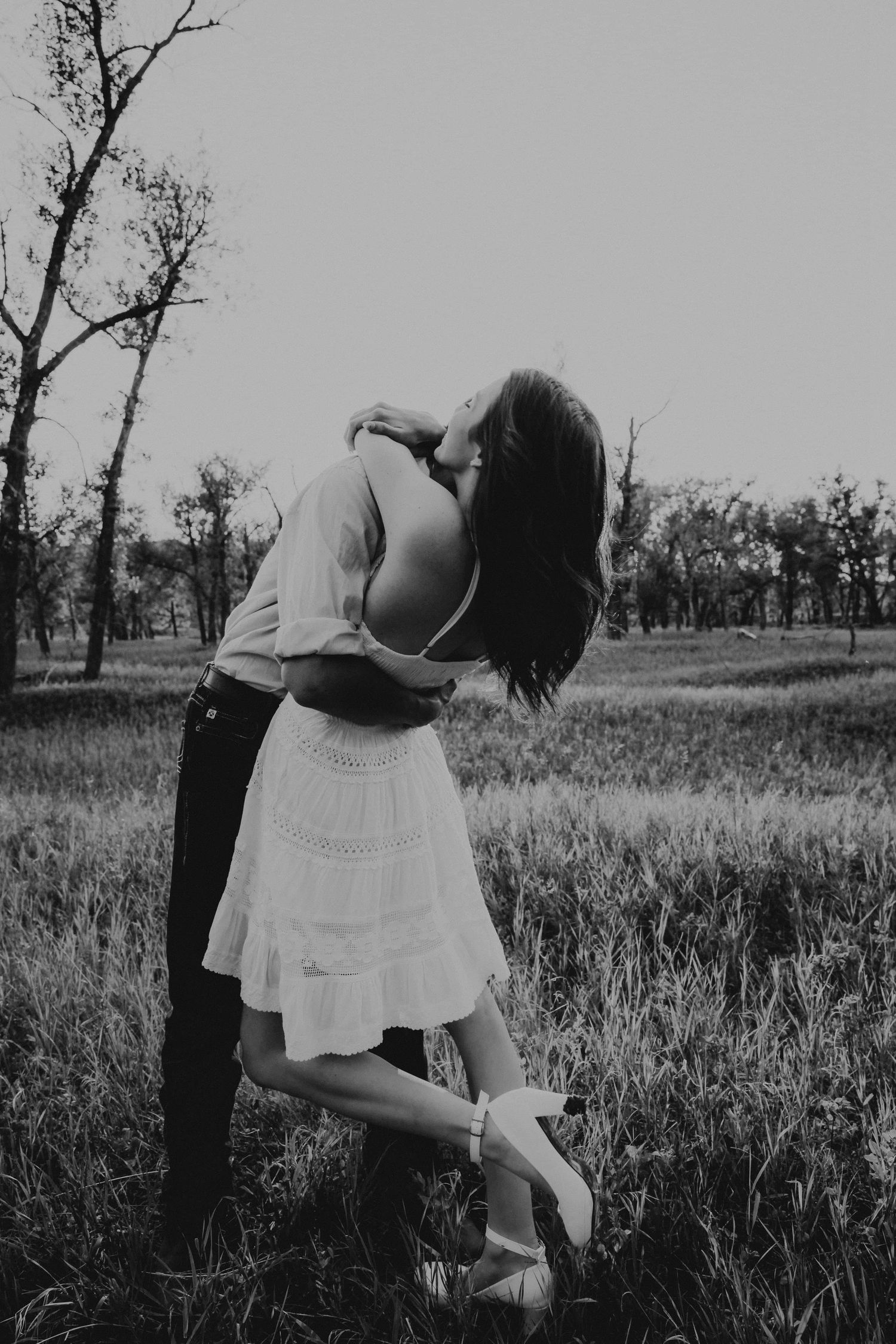 an engaged couple getting engagement photos in lethbridge alberta with engagement and wedding photographer allie cooke photography
