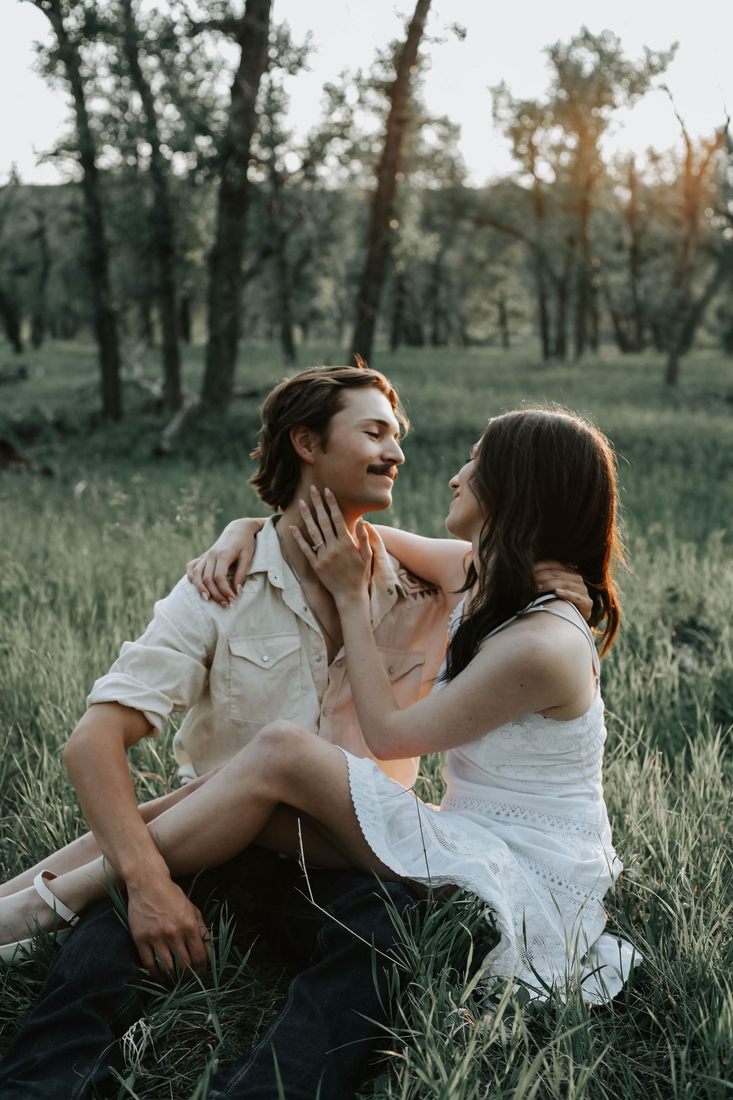 couples photographer taking engagement photos in lethbridge alberta with an engaged couple - complimentary engagement sessions with booking