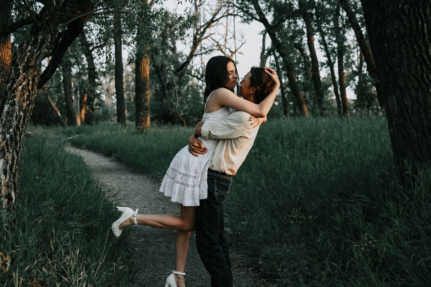 an engaged couple getting engagement photos in lethbridge alberta with engagement and wedding photographer allie cooke photography