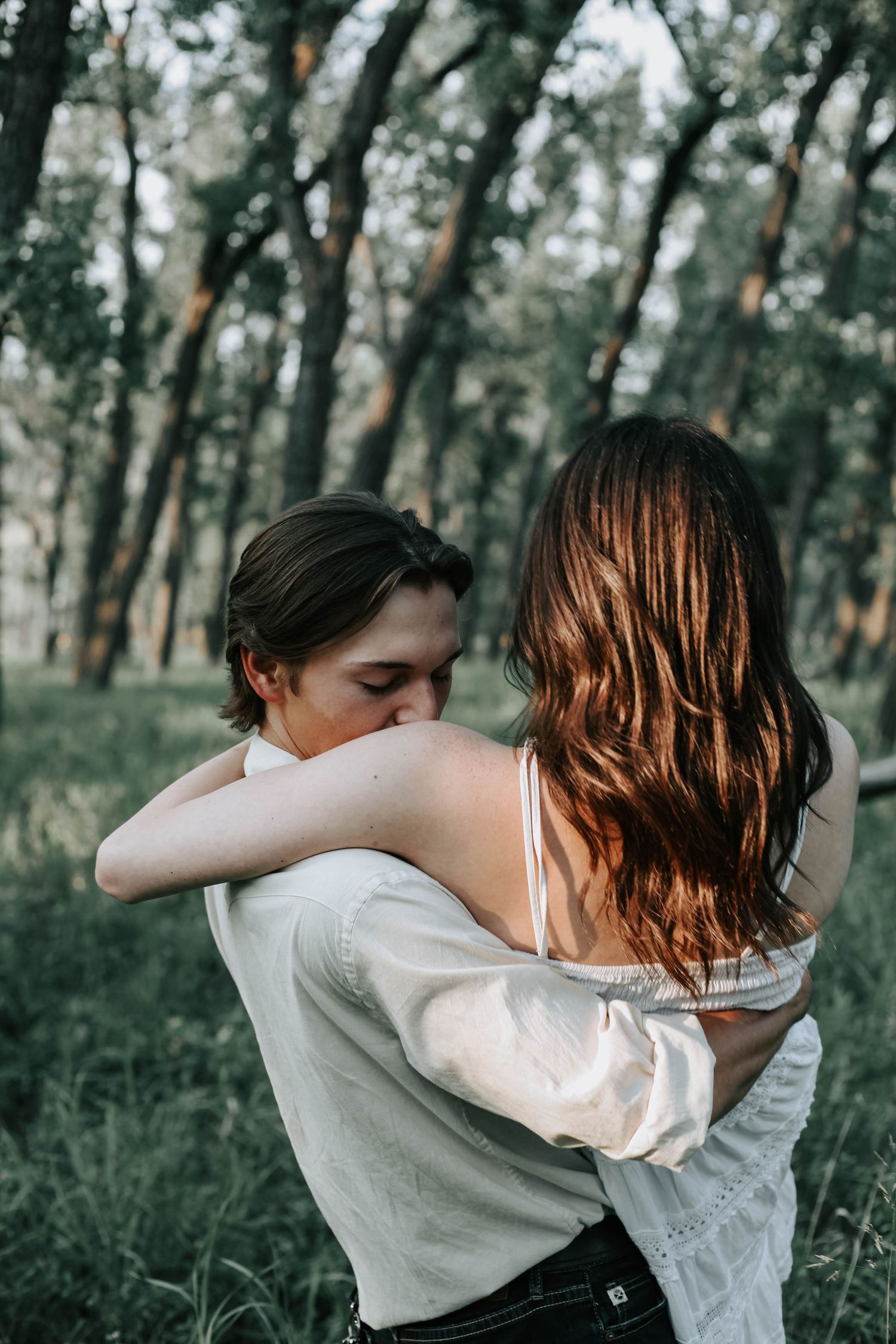 an engaged couple getting engagement photos in lethbridge alberta with engagement and wedding photographer allie cooke photography