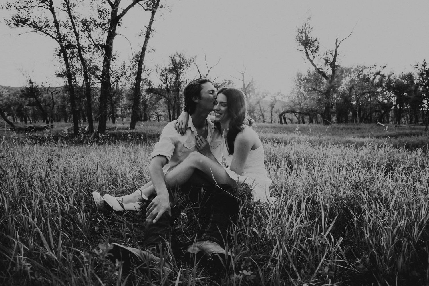 an engaged couple getting engagement photos in lethbridge alberta with engagement and wedding photographer allie cooke photography